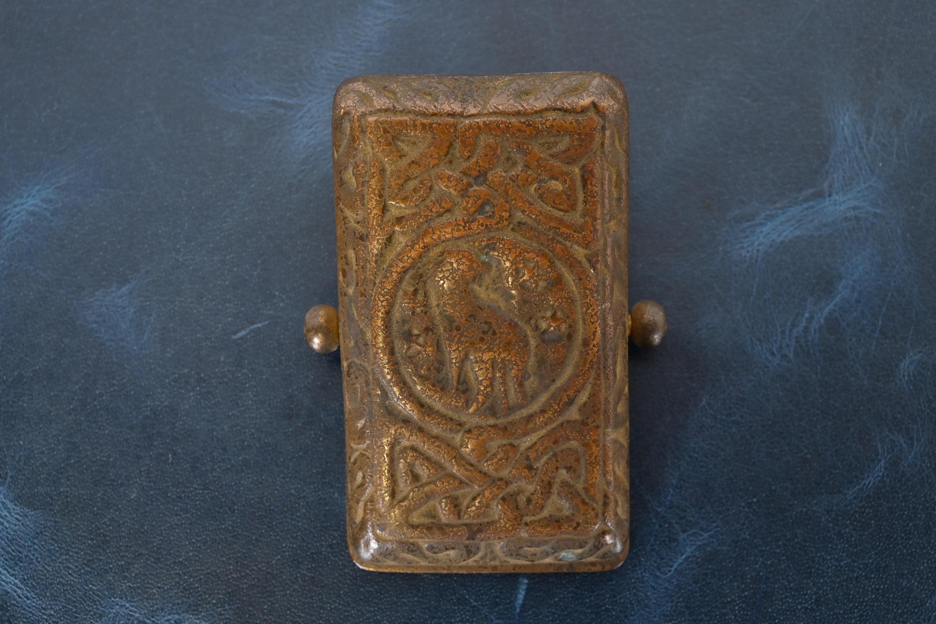 XX secolo Tiffany Studios New York Zodiac Pattern Bronze Paper Clip in vendita