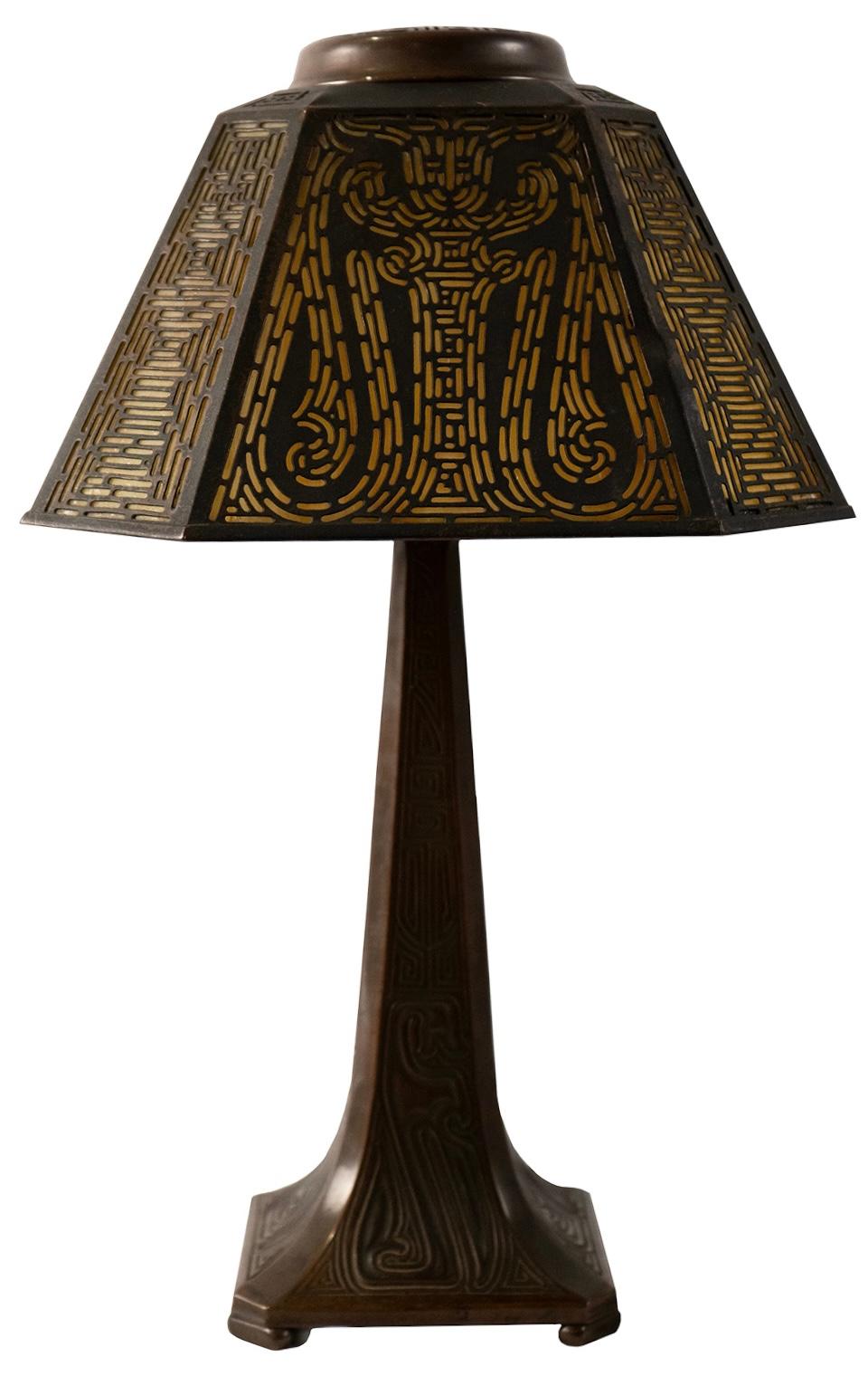 Early 20th century Tiffany Studios lamp. Made from slag glass and bronze.

Base stamped to bottom 'Tiffany Studios / New York / 535'

Shade dimensions: 5 1/2 x 10 in.

Height: 16 1/2 in.
 