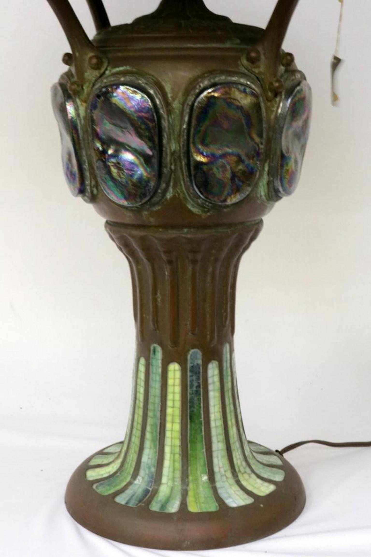 Vintage Tiffany style stained glass and bronze lamp. Dragon fly design. Antique base. Measures: 35 1/2