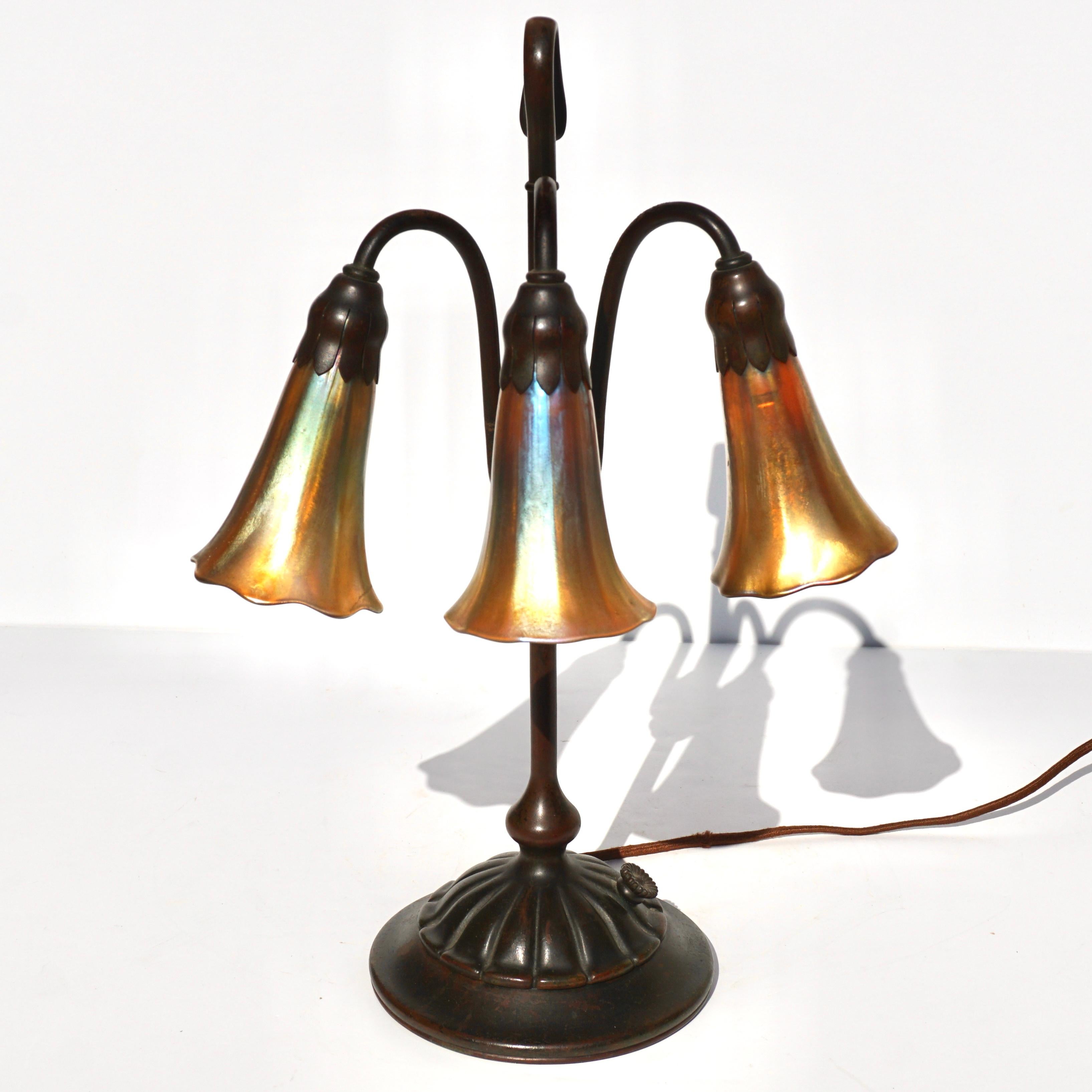 Art Nouveau Tiffany Studios Three Light Lily Bronze and Favrile Table Lamp