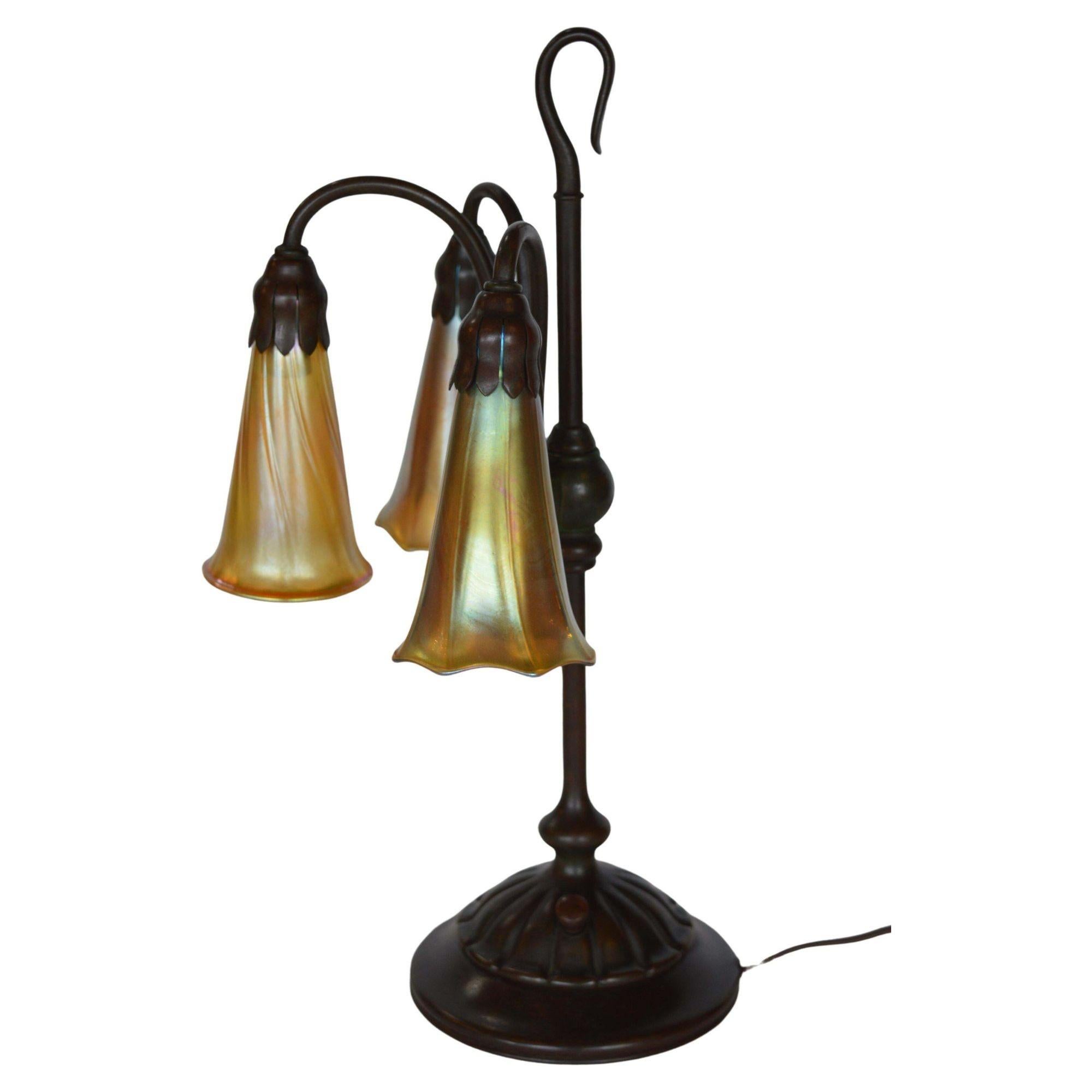 North American Tiffany Studios Three Light Lily Bronze and Favrile Table Lamp