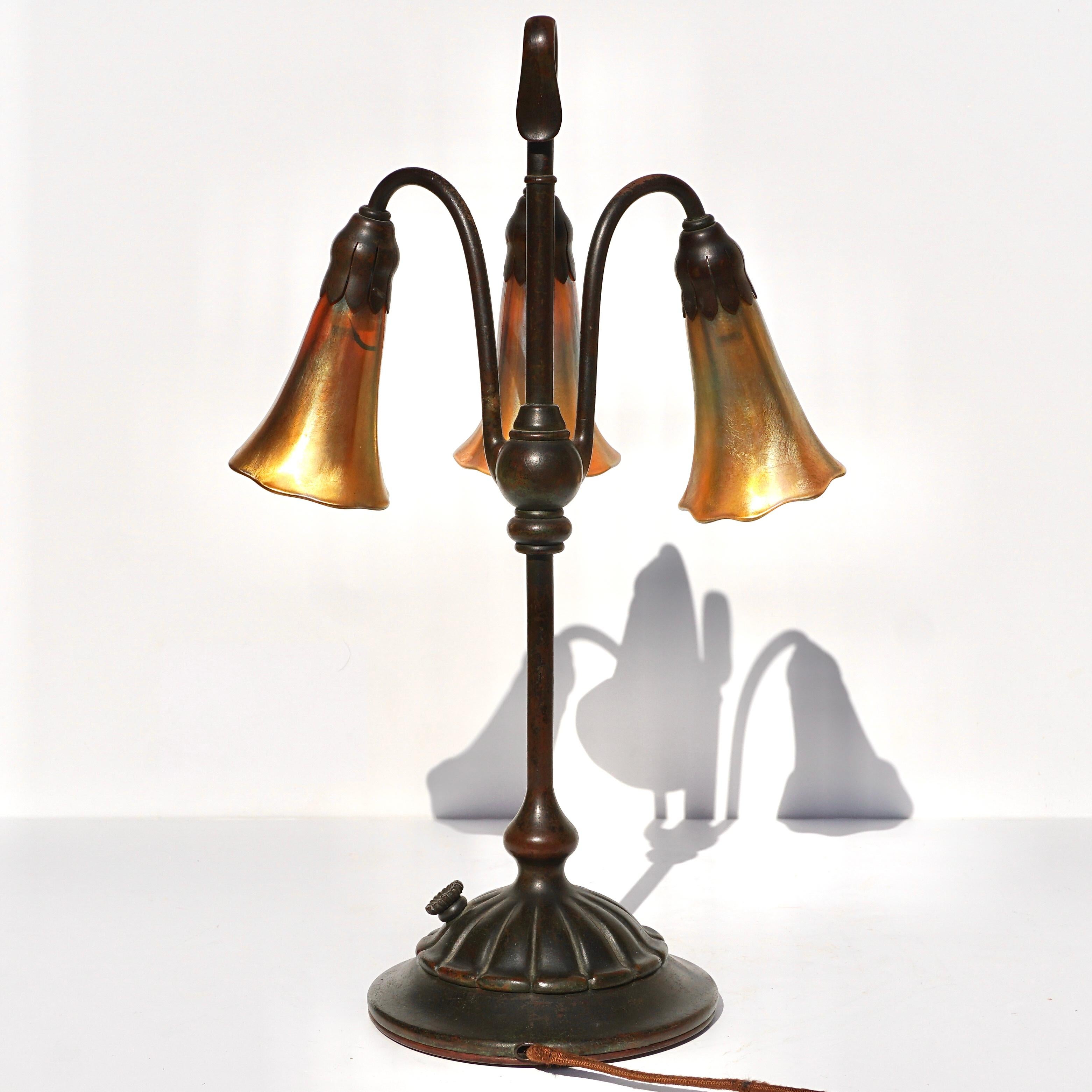 Tiffany Studios Three Light Lily Bronze and Favrile Table Lamp In Good Condition In Dallas, TX