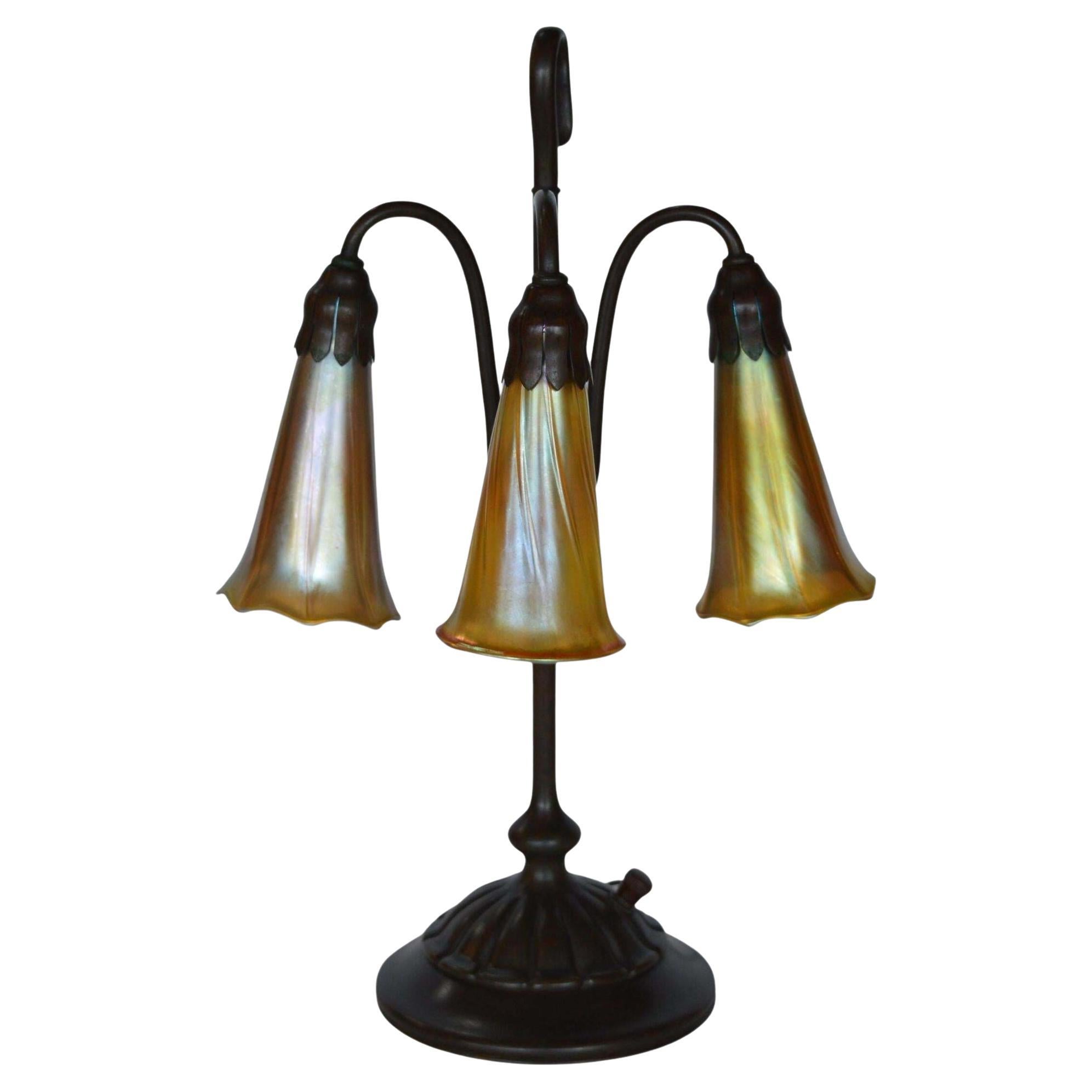 Tiffany Studios Three Light Lily Bronze and Favrile Table Lamp
