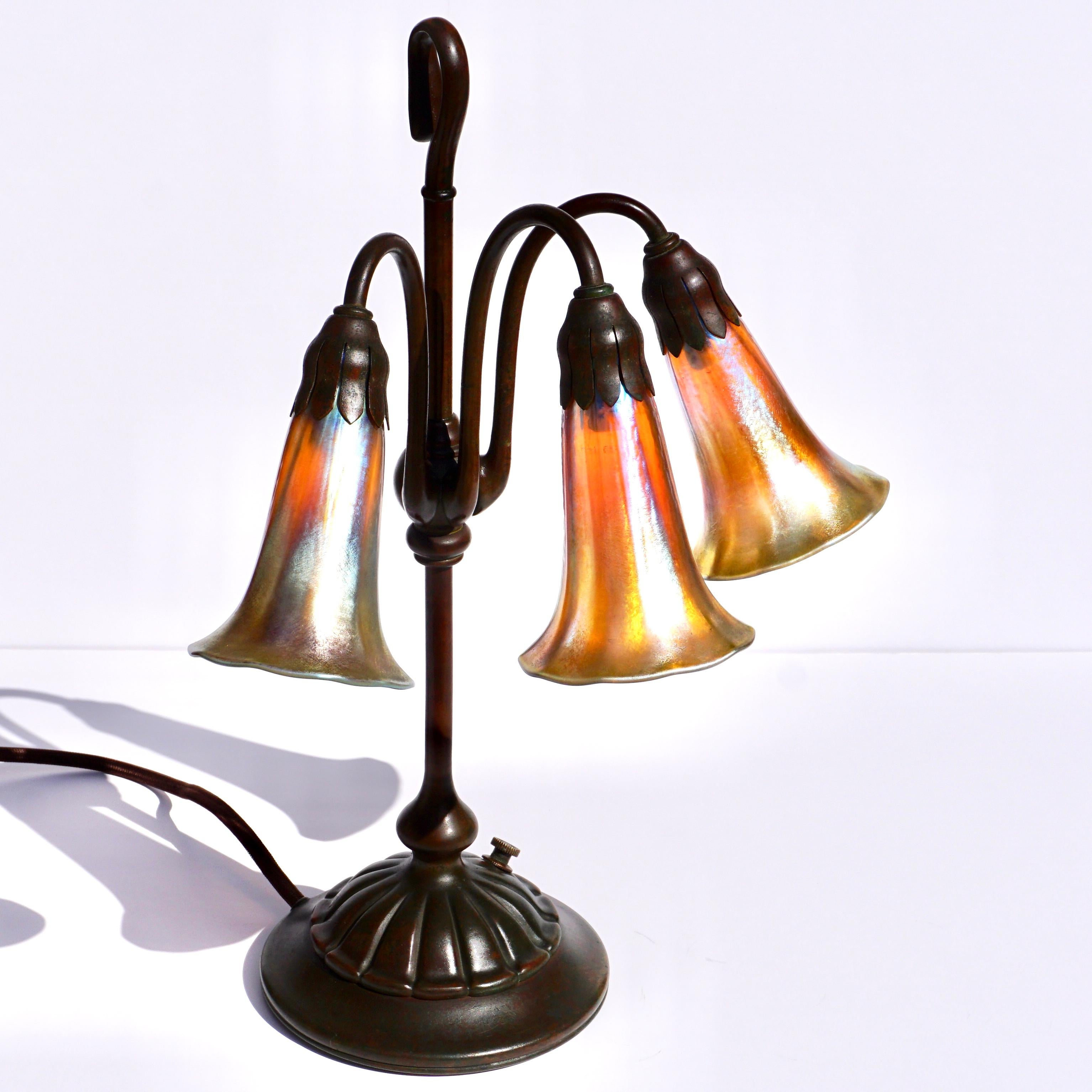American Tiffany Studios Three Light Lily Favrile and Bronze Lamp