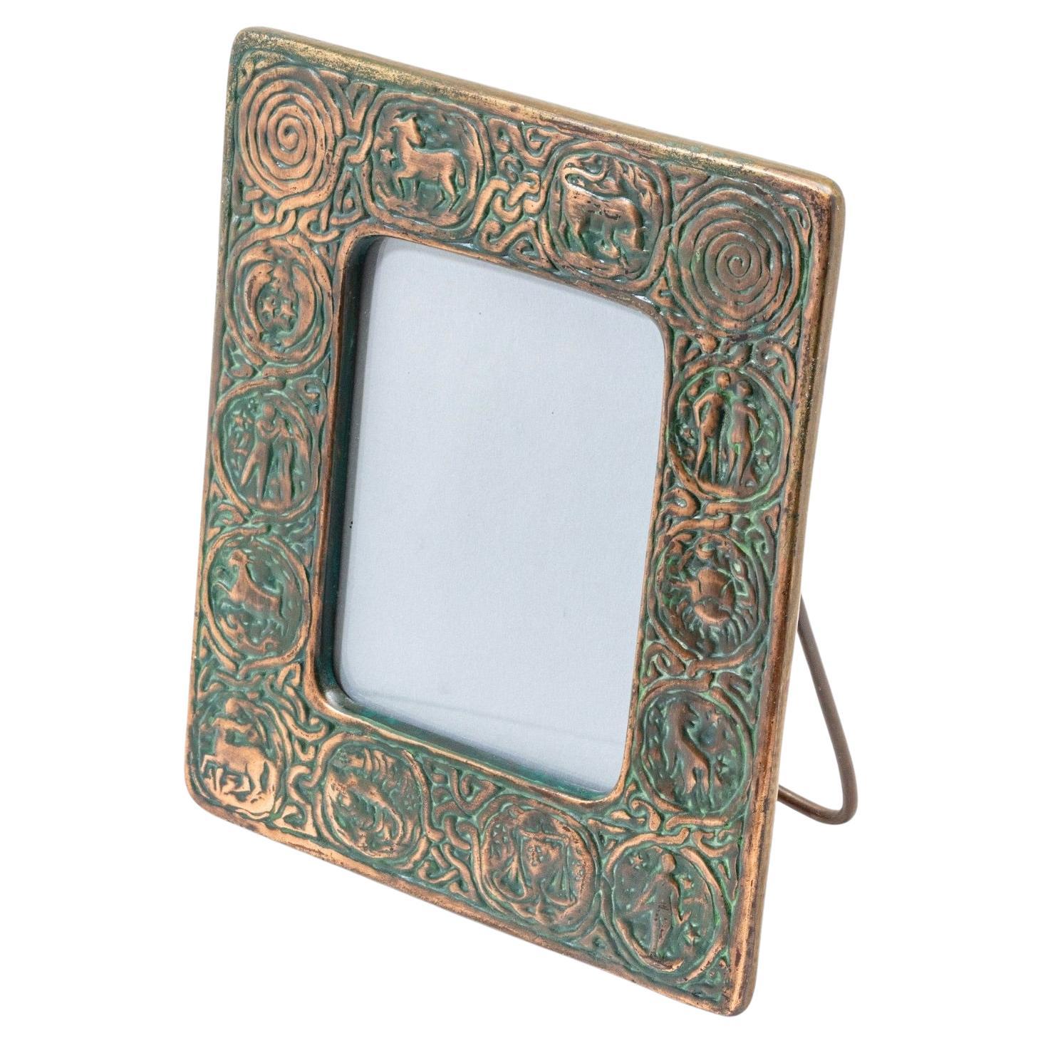 Tiffany Studios “Zodiac” Pattern Bronze Calendar Frame, Model 942, 20th Century For Sale