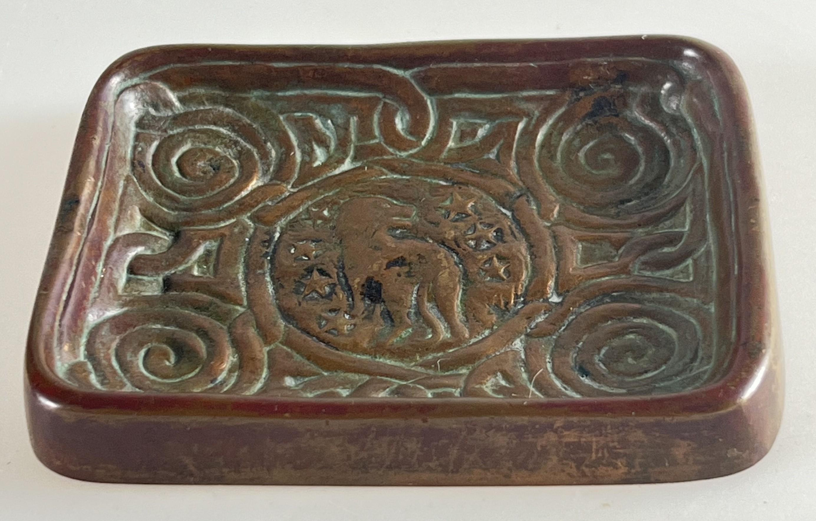 A gorgeous and scarce original Tiffany Studios patinated bronze stamp tray.  A perfect size to use for coins or as a paperweight!  With a stylized lion it's the perfect gift for a LEO or any Tiffany collector.  It retains some of the original patina