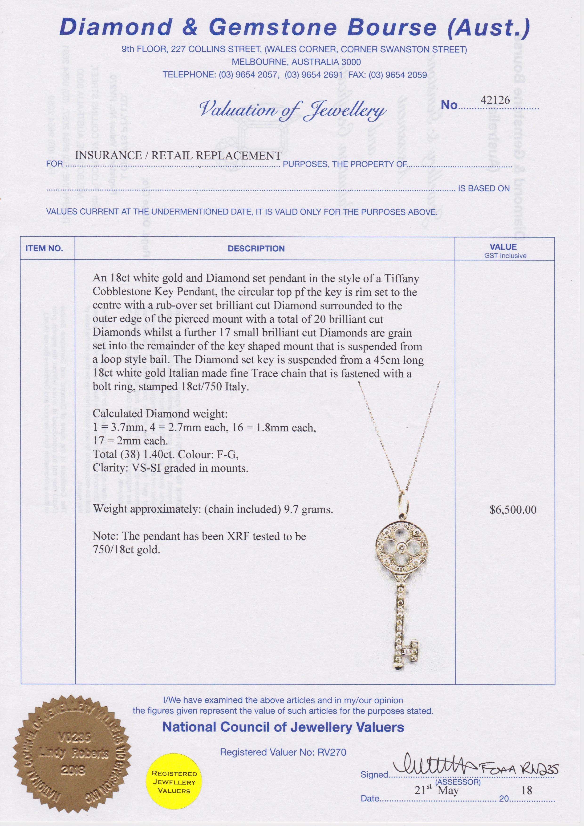 18ct White Gold Cobblestone ‘Key’ pendant set with 20 brilliant cut diamonds necklace, styled after Tiffany.  Another 17 small brilliant cut diamonds, a total of 1.40ct of diamonds. The key is suspended from a 45 cm long Italian 18ct white gold