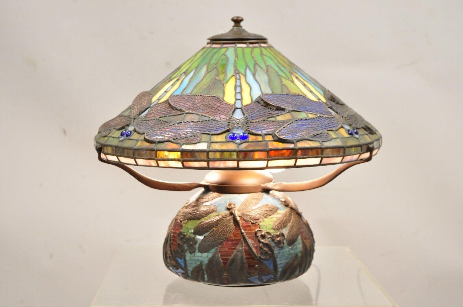 Vintage Tiffany Style High Quality Bronze and Leaded Stained Glass Blue Eye Dragonfly Table Lamp. Circa Mid to Late 20th Century. Measurements: 14