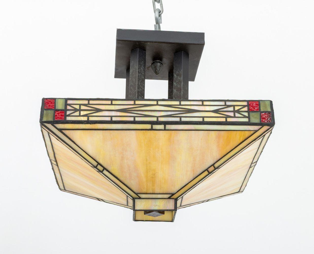Plafón semiempotrable de cristal de escoria estilo Tiffany, con diseño geométrico rojo y verde.

12