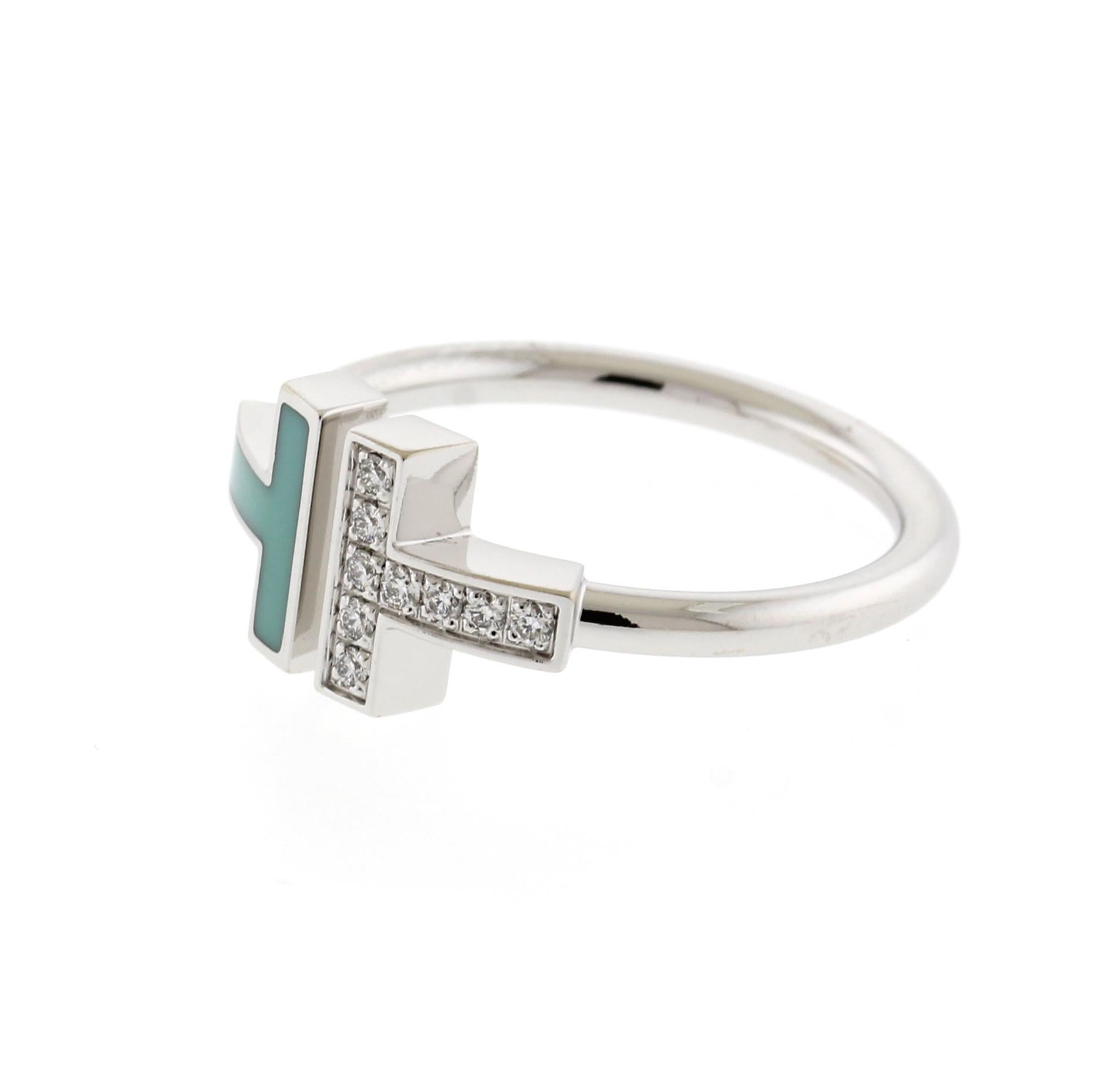 From Tiffany & Co, Diamond and Turquoise Wire Ring from the Tiffany T collection.
• Designer: Tiffany & Co.
• Metal: 18 karat white gold
• Circa: 2020s
• Diamond: 9 Diamonds =.07 
• Packaging:  Tiffany Ring Box
• Condition: Excellent

