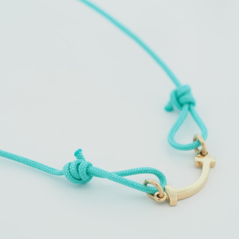 Tiffany T Smile Bracelet in Yellow Gold on a Blue Cord at 1stDibs