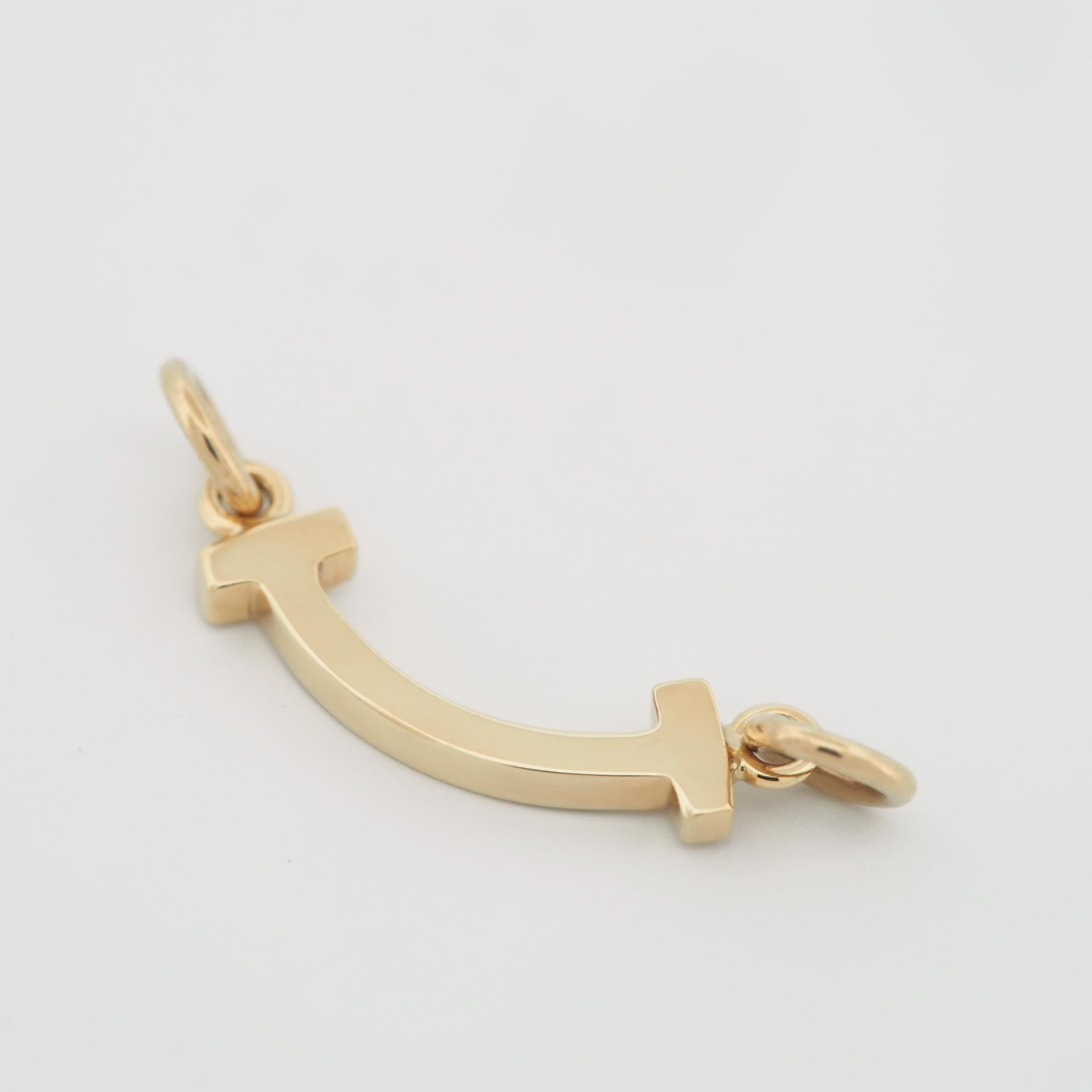 Tiffany T Smile Bracelet in Yellow Gold on a Blue Cord 1