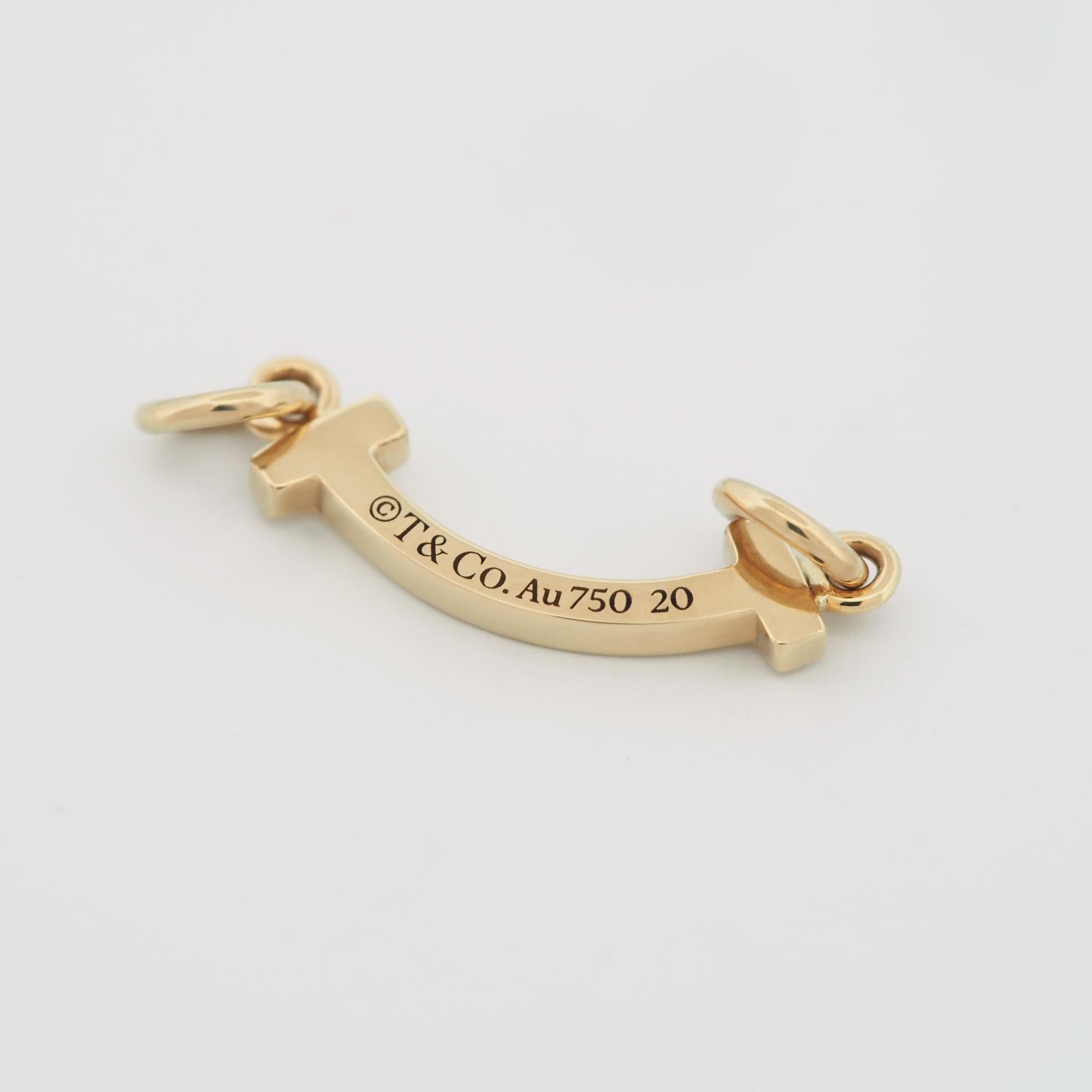 Tiffany T Smile Bracelet in Yellow Gold on a Blue Cord 2