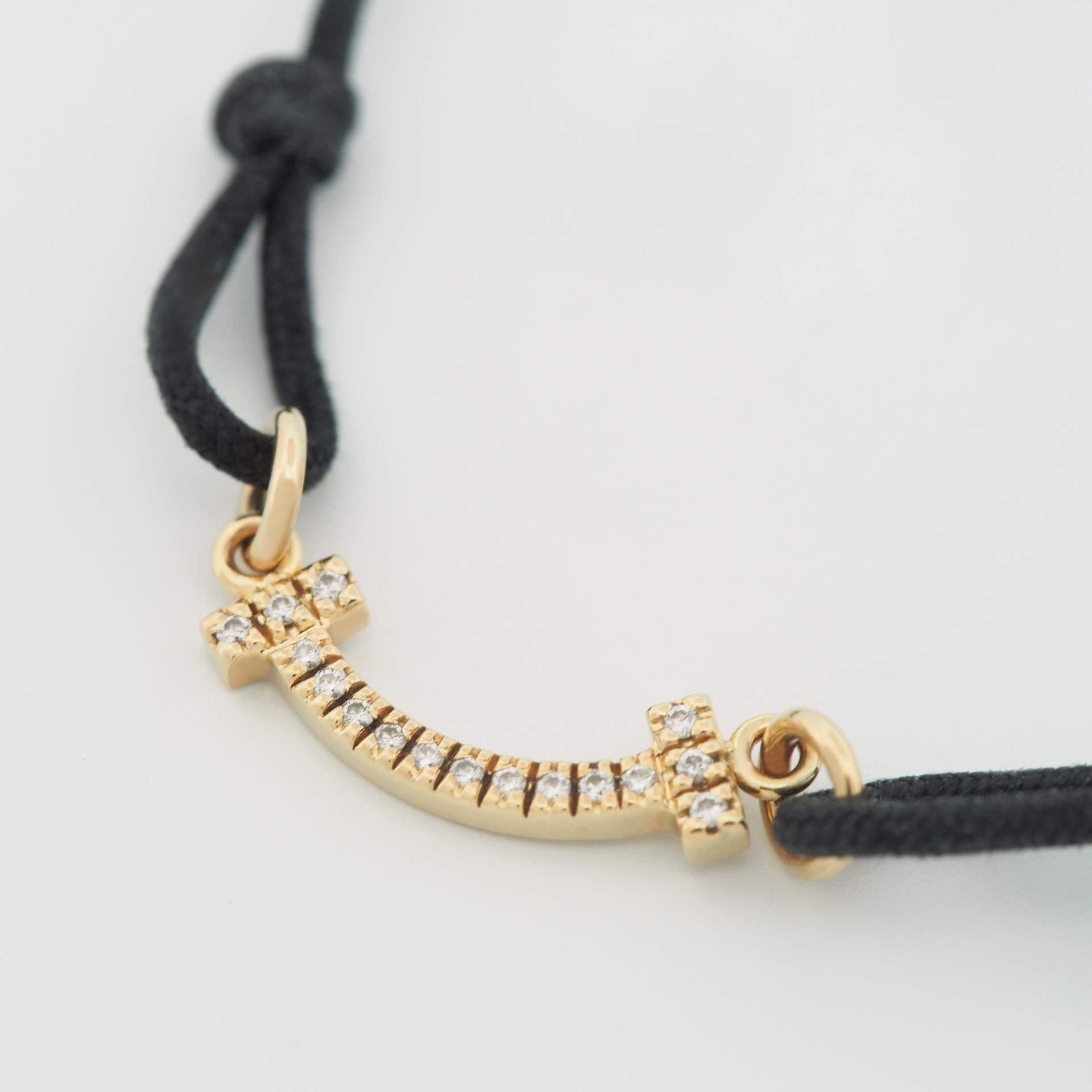 Tiffany T Smile Pulsera Con Diamantes Oro Amarillo Edición Limitada Cordón Negro en Bueno estado para la venta en Kobe, Hyogo