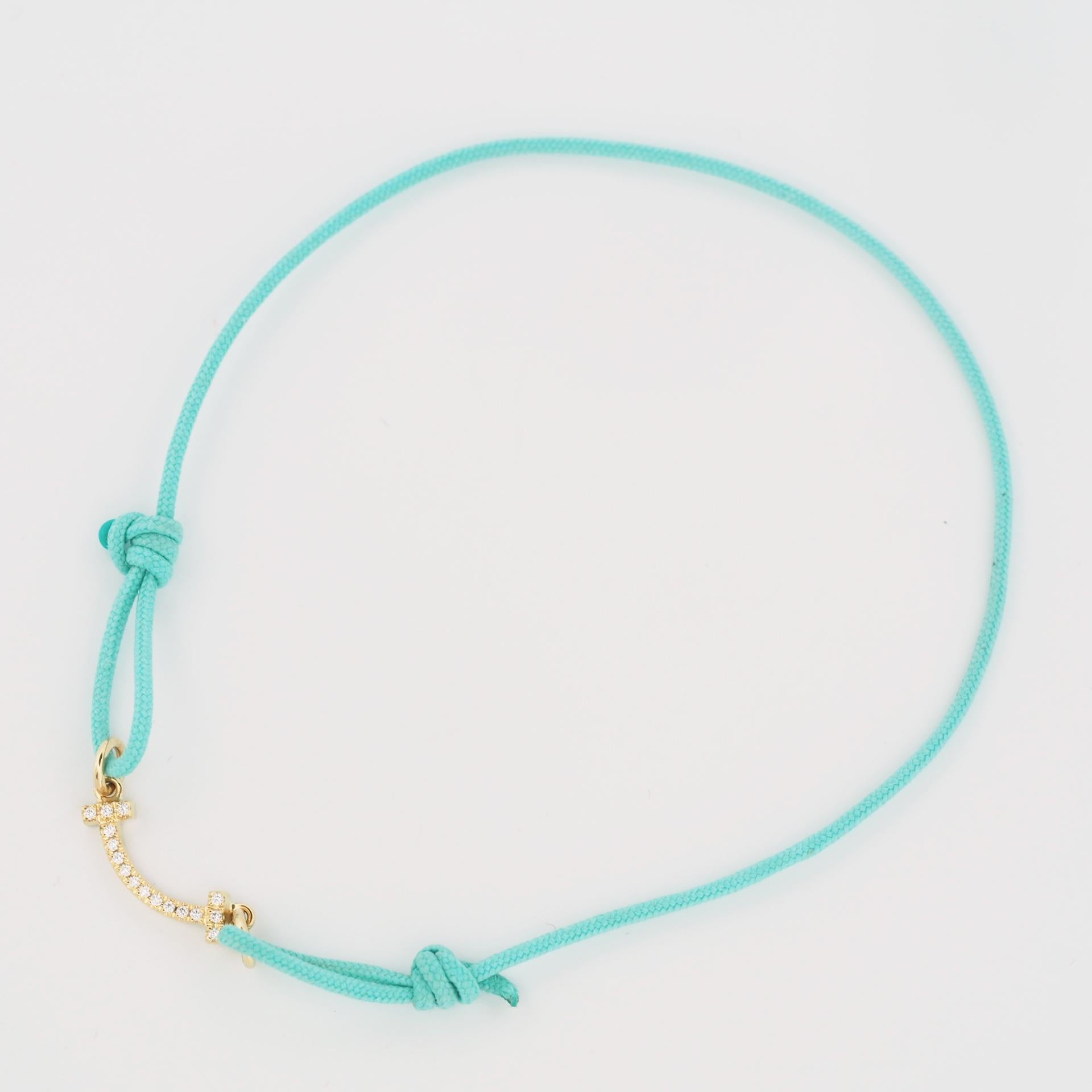 Brand: Authentic Tiffany T Smile Bracelet Limited Edition
Stones: Diamond (0.04ct)
Metal: 18K Yellow Gold
Bracelet Length: Adjustable, fits wrists from 5.25
