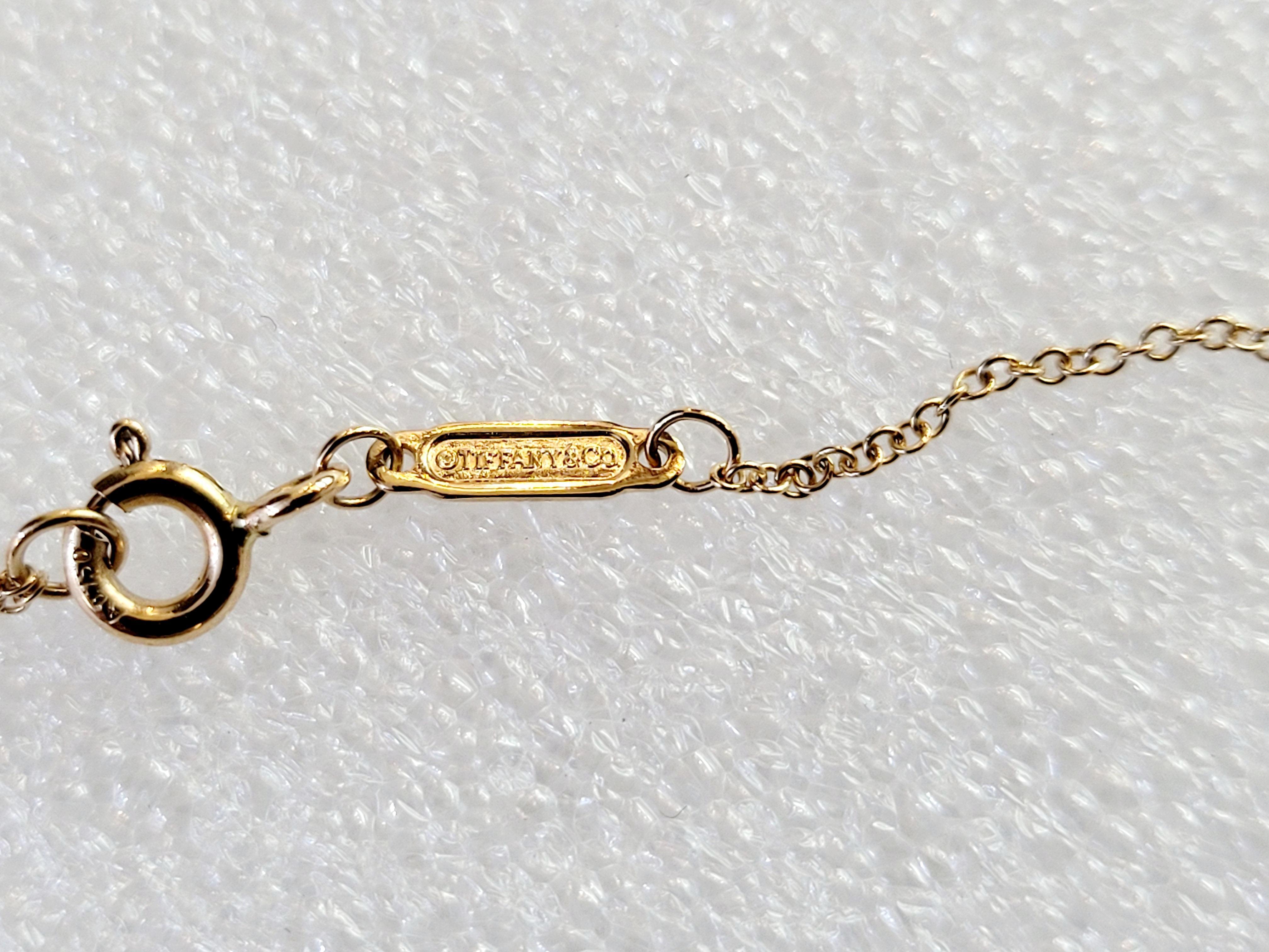 Tiffany T Smile pendentif en or jaune Excellent état - En vente à New York, NY