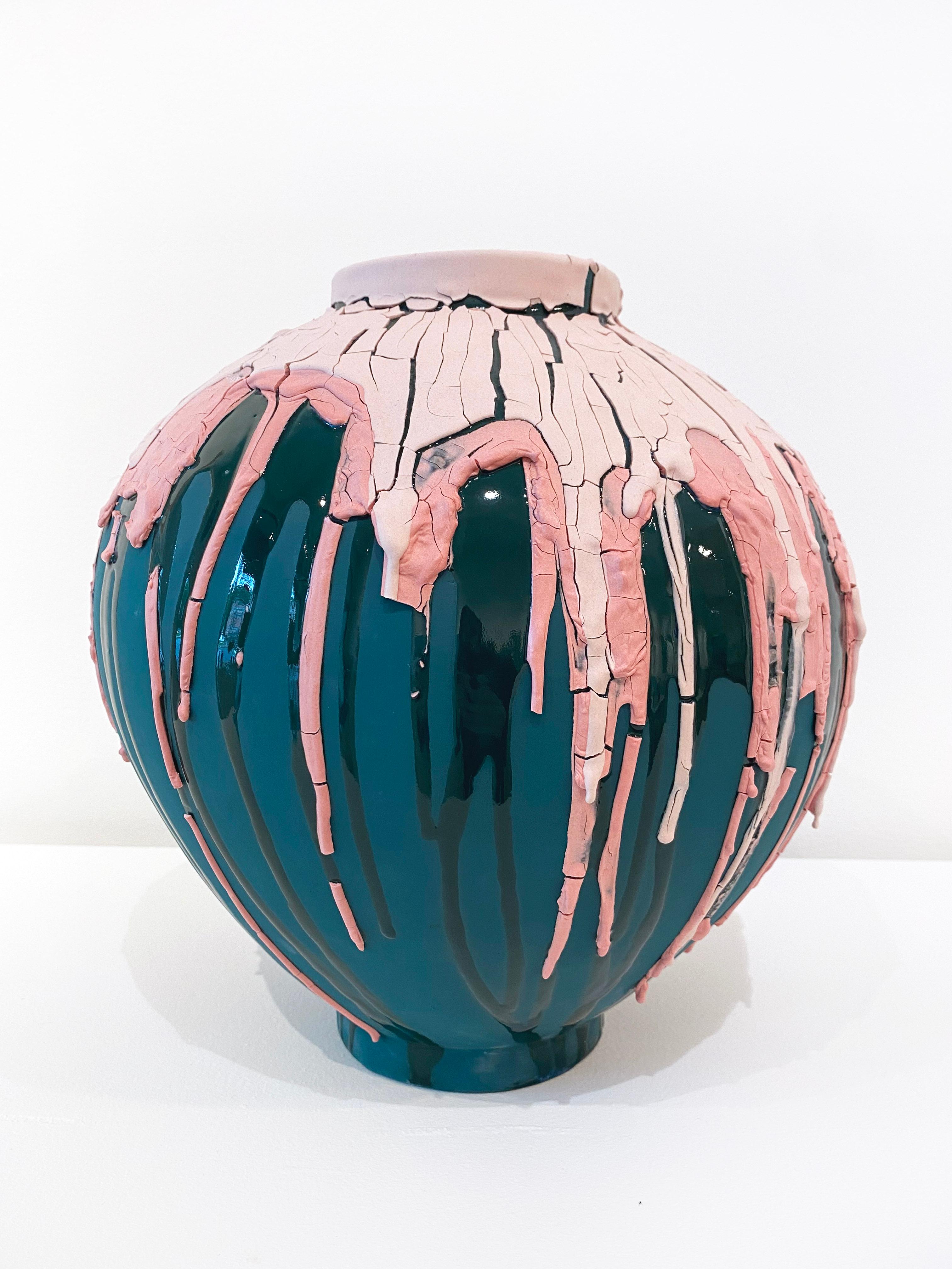 'Pretended To Be Okay' 2021 by San Francisco based ceramist, Tiffany Tang. Porcelain, 11.25 x 11 x 11 in. Tang creates her forms on the wheel out of porcelain and then coats them in various layers of colored slip to achieve her dripping and cracked