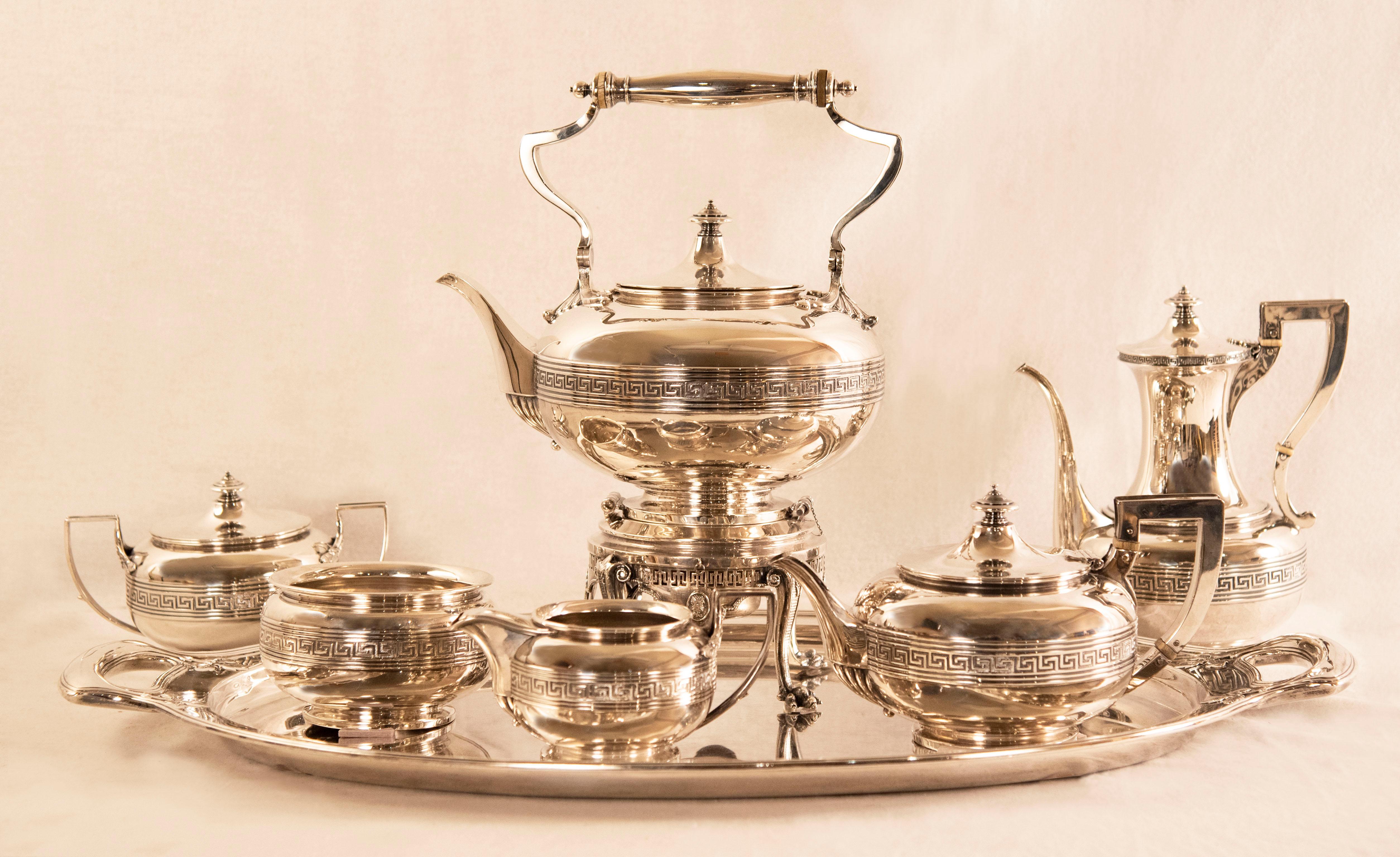 Tiffany tea and coffee English sterling silver set
6 pieces and silver tray included.