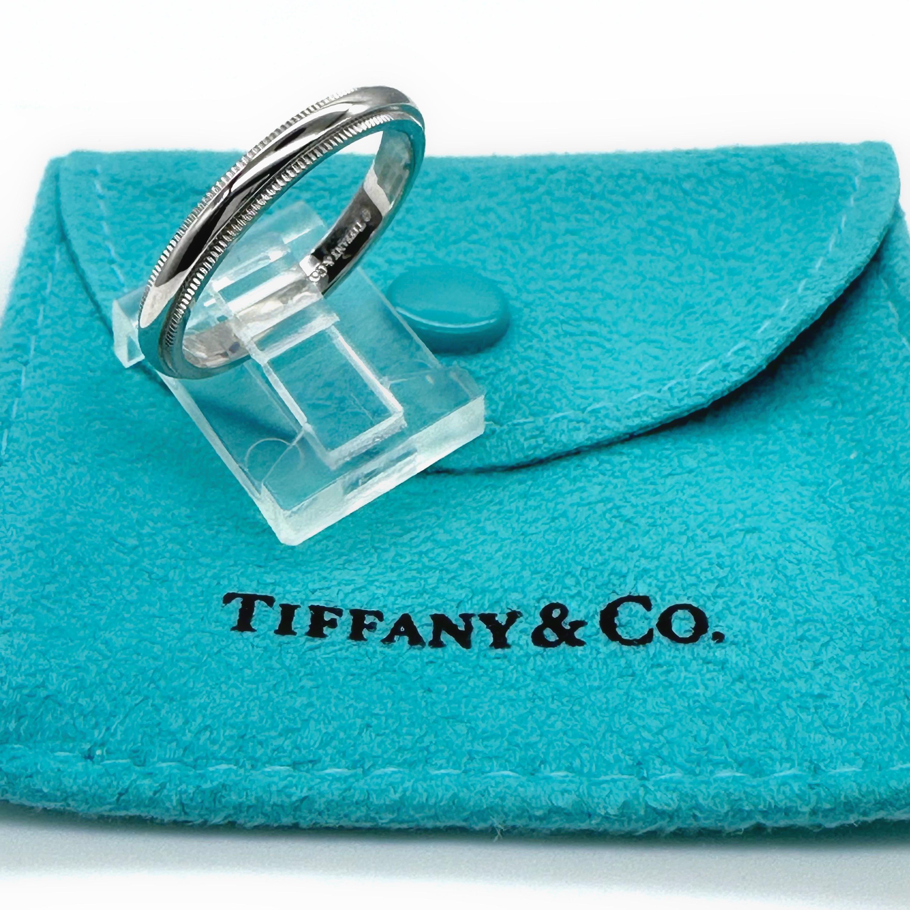 Tiffany & Co. Together Milgrain Band Ring
Style:  Band
Ref. number:  60001759
Metal:  Platinum PT950
Size:  9.25
Measurements:  3 mm
Hallmark:  ©TIFFANY&CO. PT950
Includes:  T&C Ring Pouch
Retail:  $1,500

Sku#1900TERL04212023