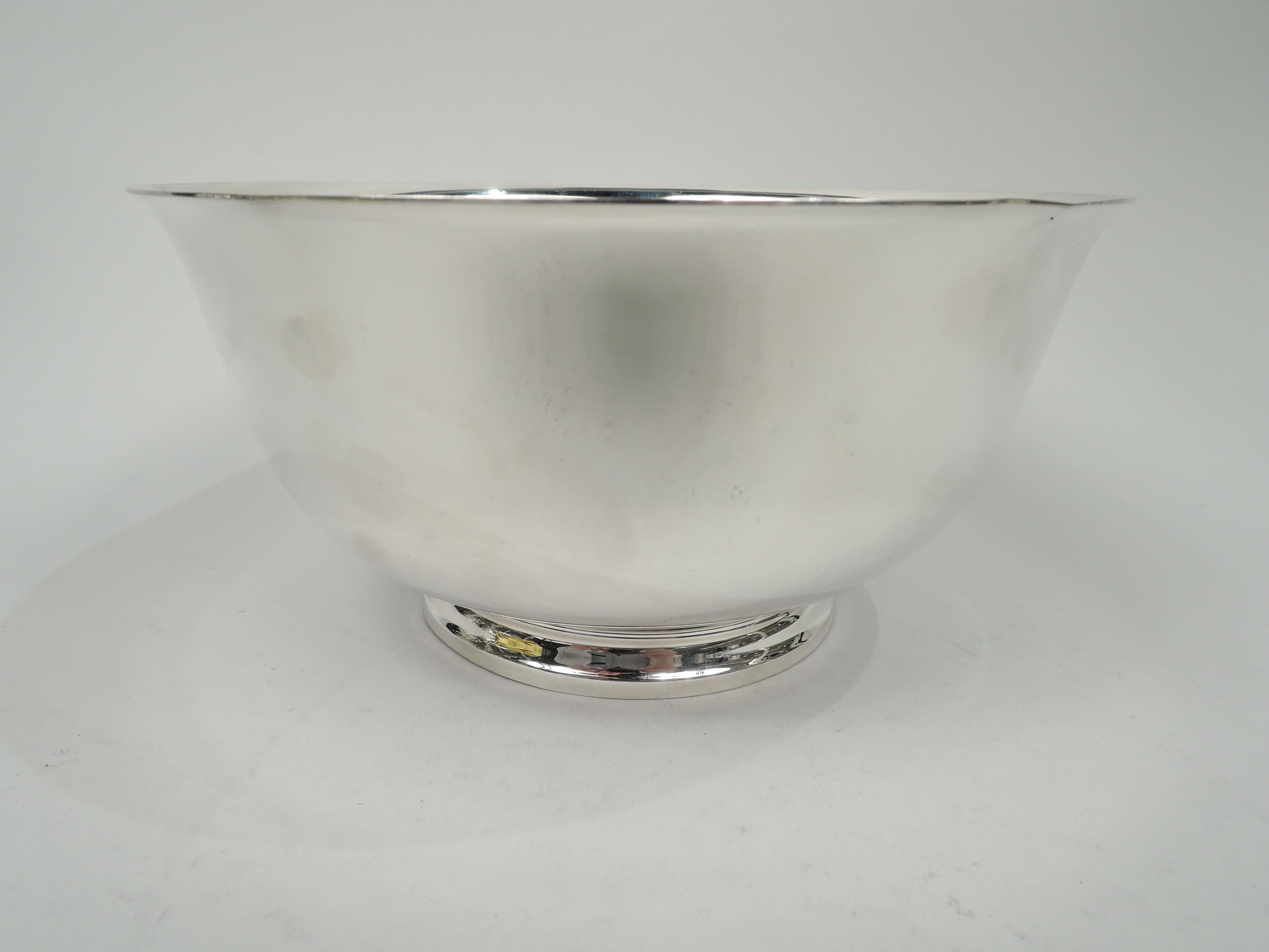 Traditional sterling silver Revere bowl. Made by Tiffany & Co. in New York. Curved and tapering sides, flared rim, and stepped foot. For serving or presentation. Lots of room for engraving. Fully marked including maker’s stamp and postwar pattern