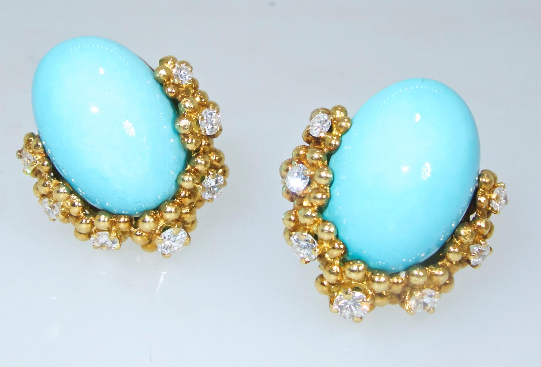 Tiffany & Co. Persian Turquoise and fine white diamond 18K earrings.  Well made with 14 fine bright white diamonds amounting to 1 ct., and centering fine Persian Turquoise.  This 18K gold earrings are slightly less than 1 inch in length, they are