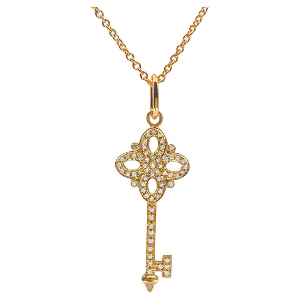 TIFFANY and CO. Diamond Yellow Gold Cross Pendant and Necklace at 1stDibs