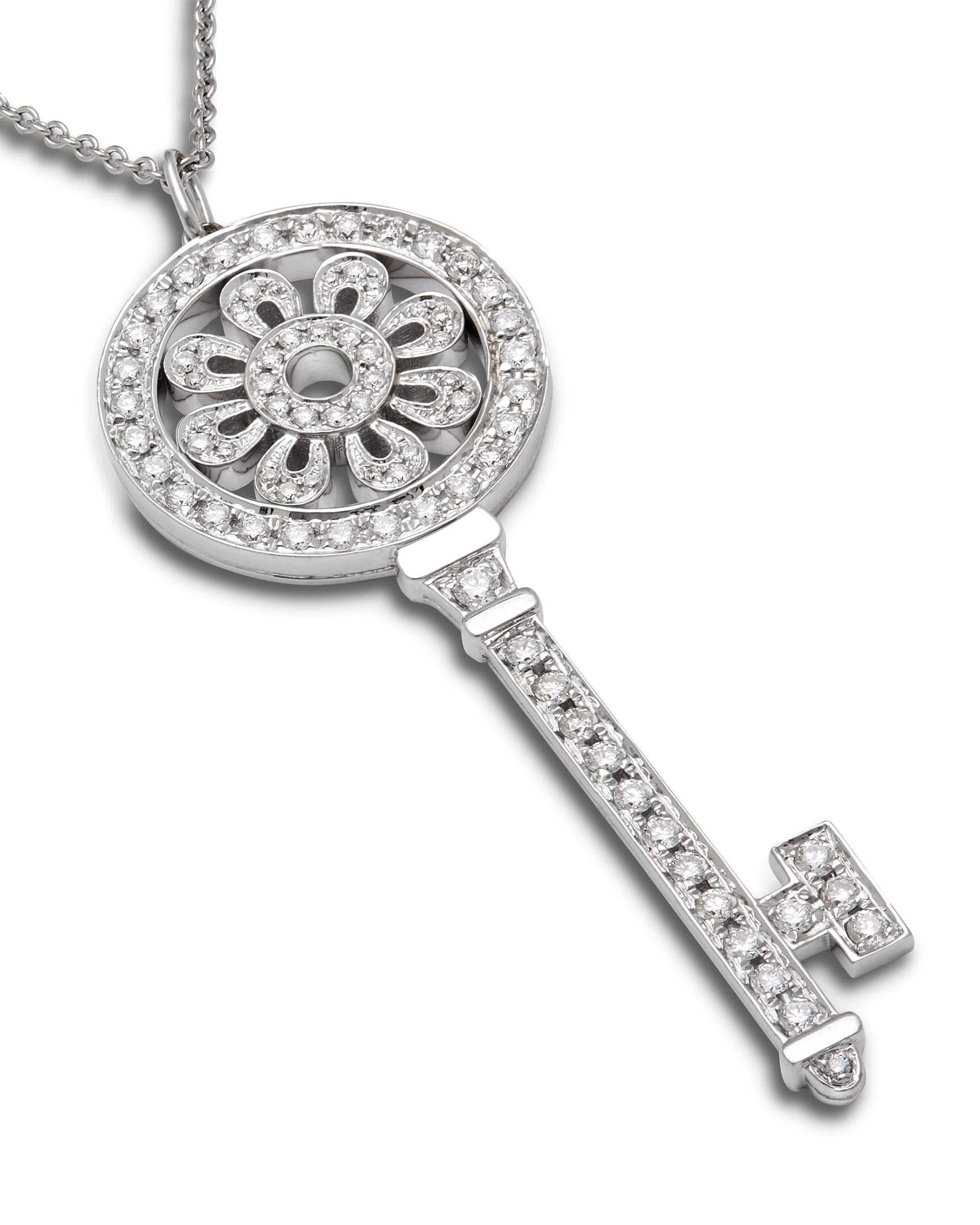 TIFFANY & CO, A DIAMOND PETALS KEY PENDANT NECKLACE

Tiffany Keys are radiant symbols of a bright future. This dazzling pendant glows with diamonds, illuminating the face.
Brilliant beacons of optimism and hope, Tiffany Keys are radiant symbols of a