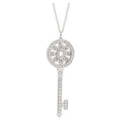 Tiffany white gold diamond large petal key pendant and chain.