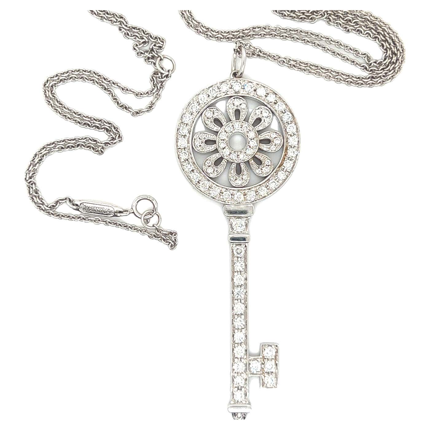 Tiffany white gold diamond large petal key pendant and chain. For Sale ...