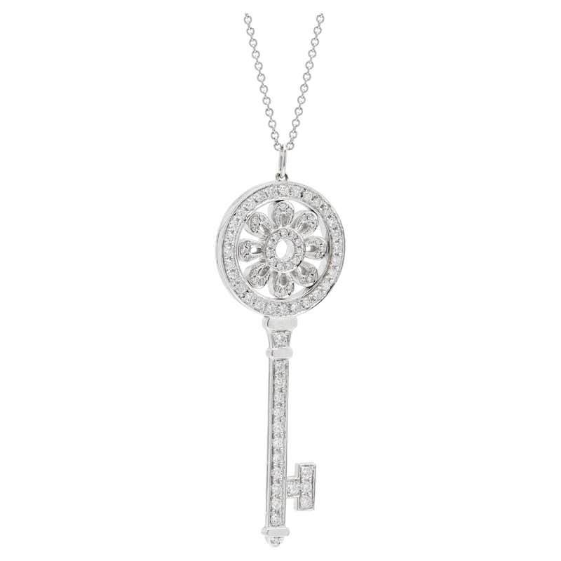 Dimand Key Rings Tiffany and Co. 18K White Gold Diamond Petals Key Pendant For Sale at ...
