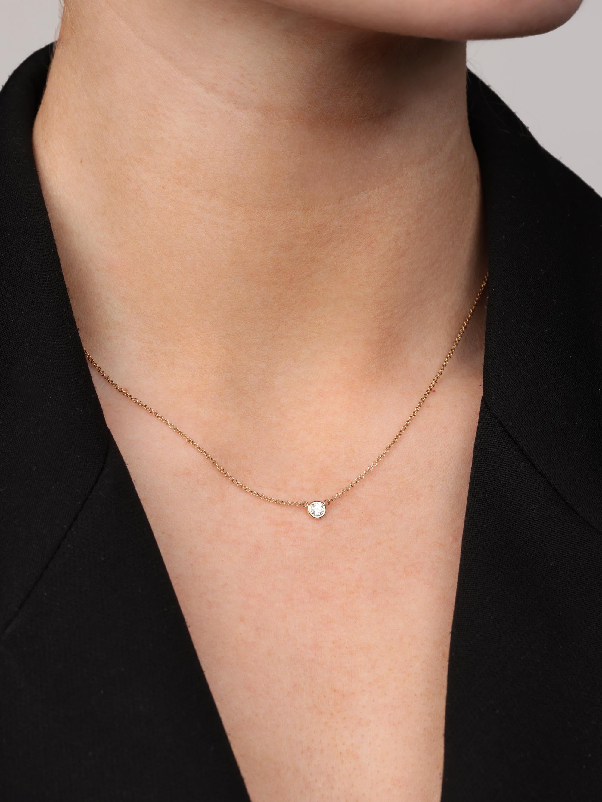 Tiffany & Co. 0.17ct Brilliant Cut 18ct Yellow Gold Elsa Peretti Diamonds by the Yard Solitaire Pendant

Product Details
Xupes Ref: J1499
Brand: Tiffany & Co.
Model: Diamond by the Yard Necklace
Type: Pendant
RRP: £1,500
Material(s): 18ct Yellow