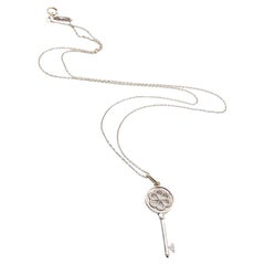 TIFFANY&Co. key necklace in white gold and diamonds