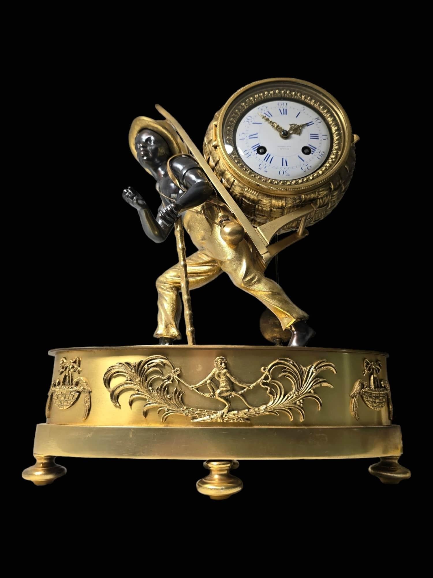 Bronze Tiffany&Co Mantel Clock “Le Portefaix” After Design By Jean-André Reiche For Sale