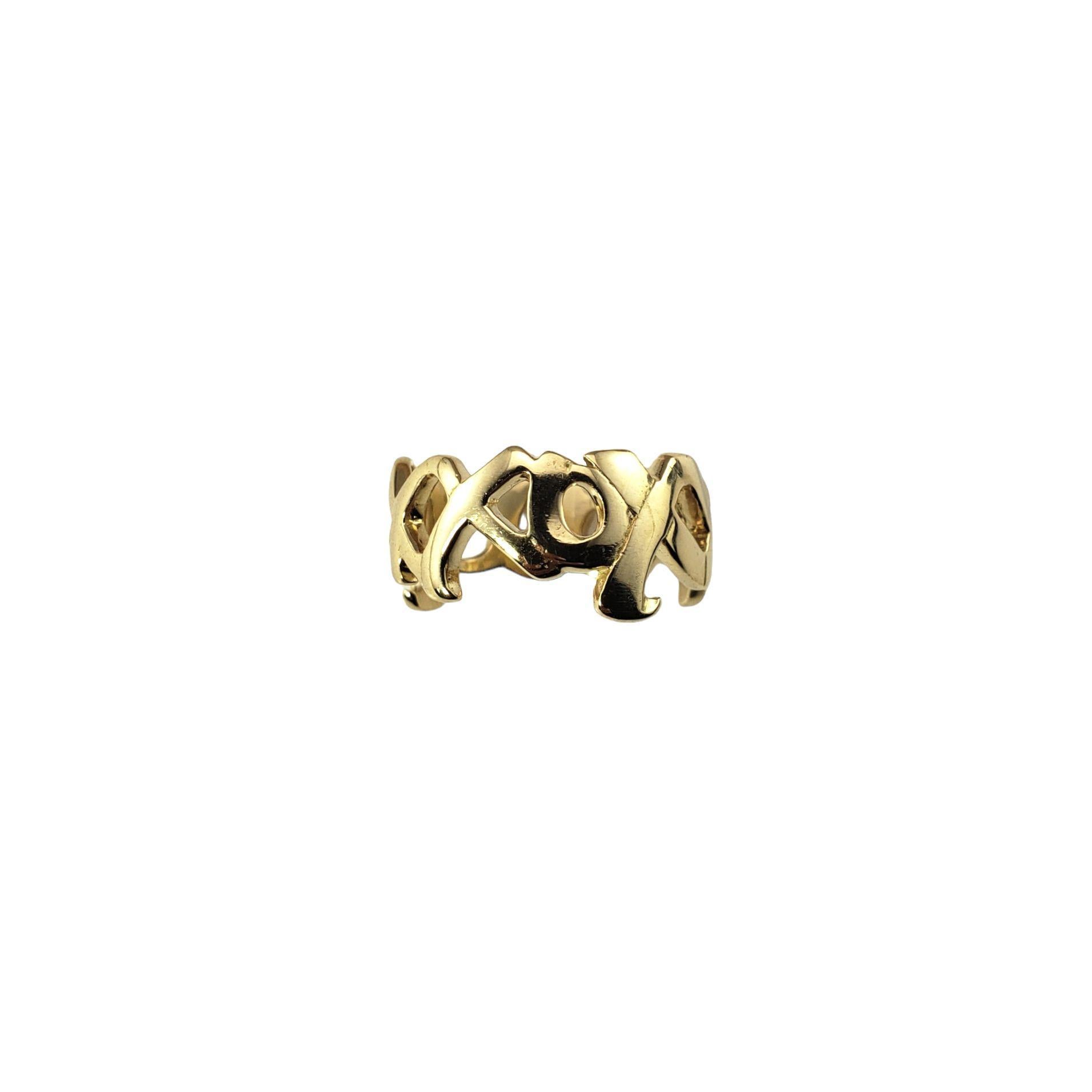 Tiffany & Co. Paloma Picasso 18 Karat Yellow Gold Hugs and Kisses Ring Size 6.75-

This elegant ring by Paloma Picasso for Tiffany & Co. features the traditional symbols for hugs and kisses crafted in 18K yellow gold.

Width: 10.3 mm.

Ring size:
