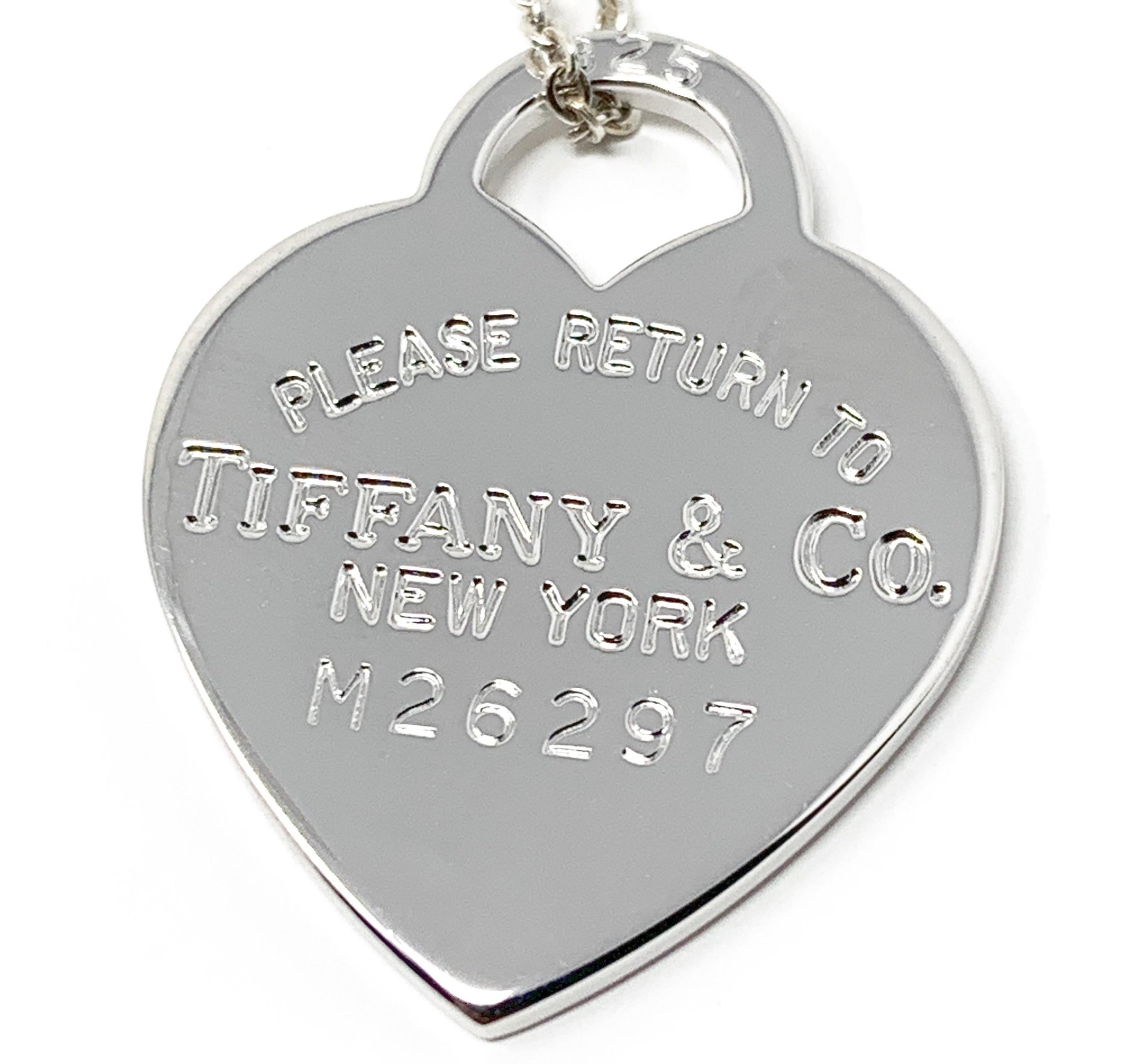 Tiffany and Co.925 Pendentif à breloque en forme de cœur en argent et  plaqué or blanc sur 1stDibs