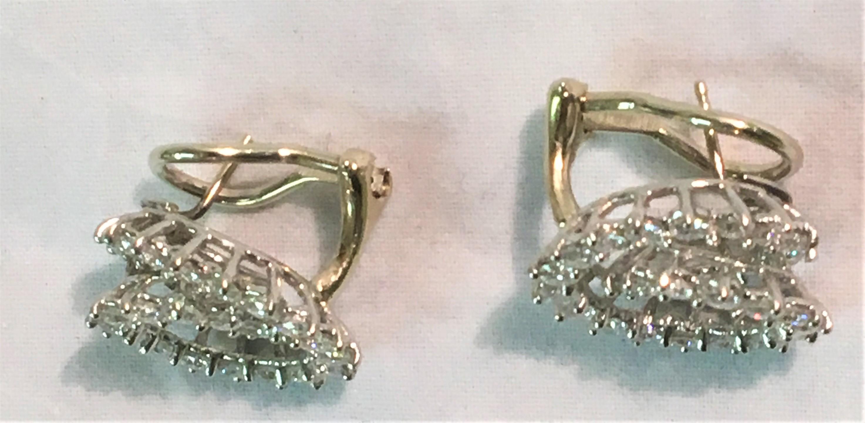 diamond swirl earrings