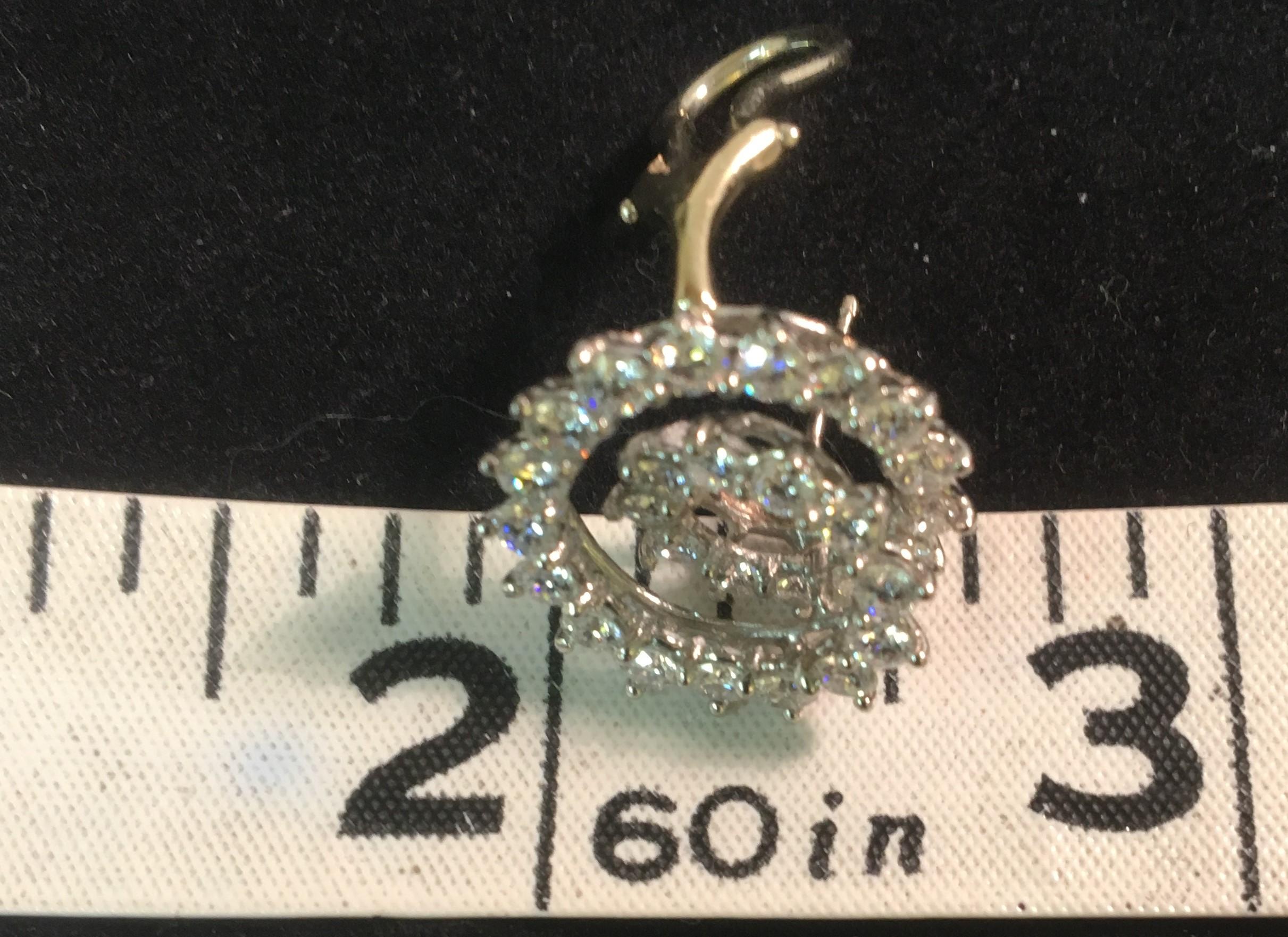 Tiffany & Co. 3.92 Carat Diamond Platinum Swirl Earrings In Good Condition In Cincinnati, OH