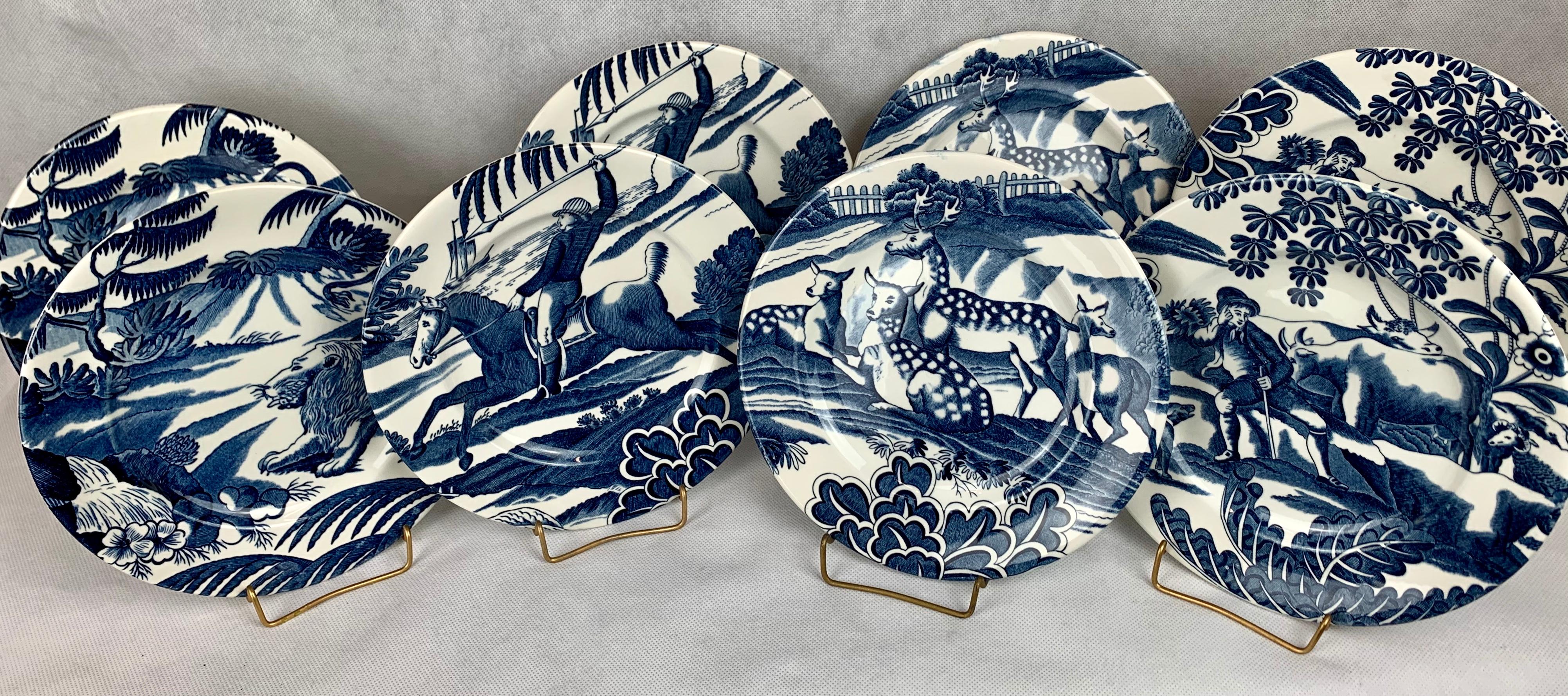 Set of 8 animal motif plates designed by Tiffany & Co. and made by Johnson Brothers in England. There are four designs and we have two of each.  The set of plates are done in a lively cobalt blue on white and would be suitable on a table or hung on