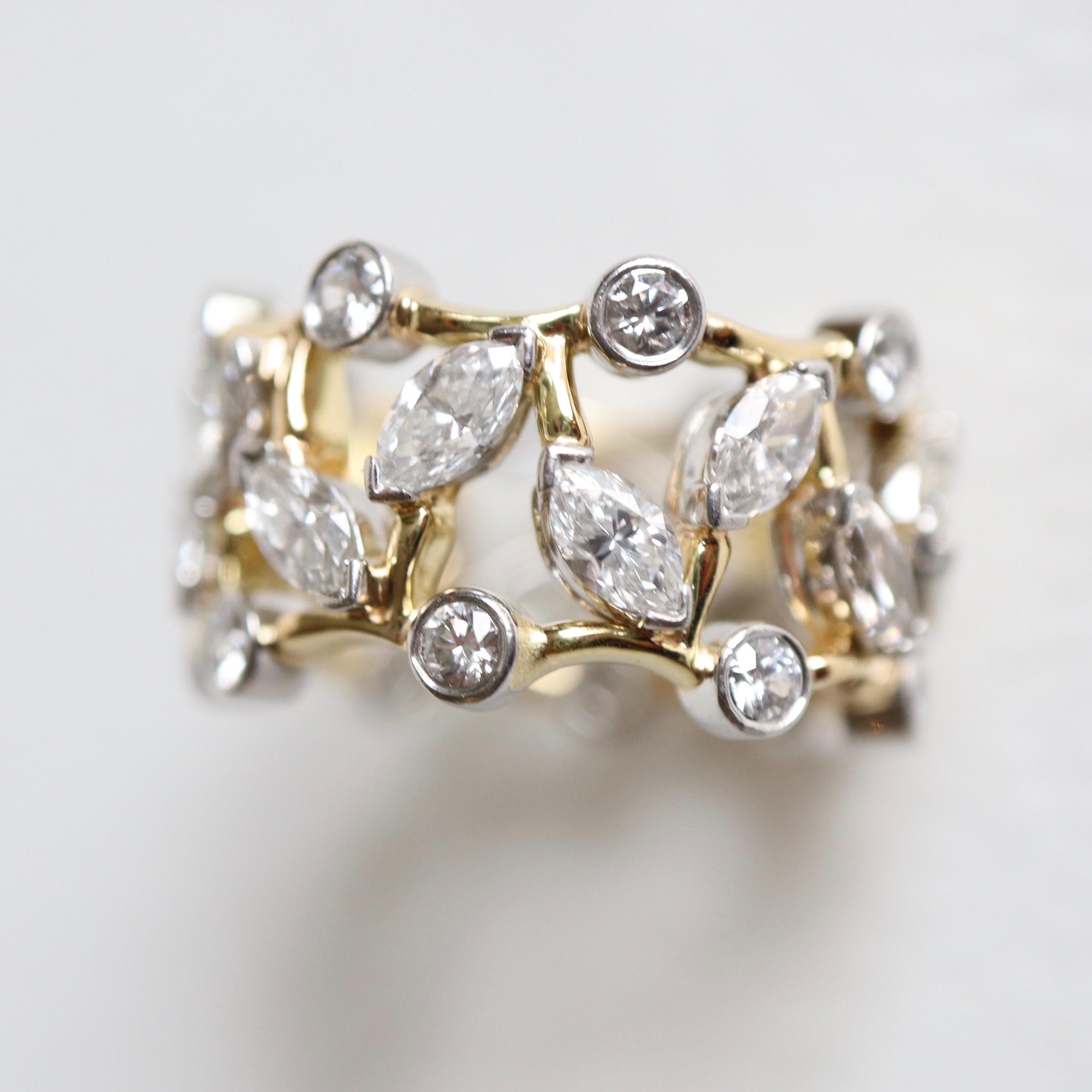 TIFFANY's & Co Yellow 18 Carat Gold and 950 Platinum ALLIANCE Ring set with 16 Shuttle Diamonds each weighing approximately 0.15 Carats for a total Weight of approximately 2 Carats and 16 Brilliant cut Diamonds set with approximately 0.05 carats for