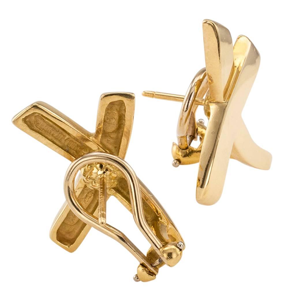 Paloma Picasso graffiti X gold earrings for Tiffany & Co circa 1984. Crafted in 18-karat yellow gold and signed Paloma Picasso Tiffany & Co. Fitted with omega and post backs. Why not make someone happy today? Better yet, reward Yourself! You deserve