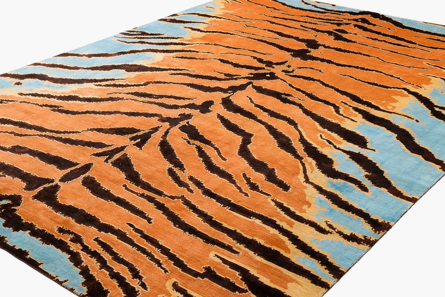 A Carini Classic, this Tiger Caramel luxurious area rug is exudes power and fashion. Designed by Joseph Carini, this has been a mainstay in his collection for over 20 years. Shown here in one of our favorite colorways, the caramel tiger animal print