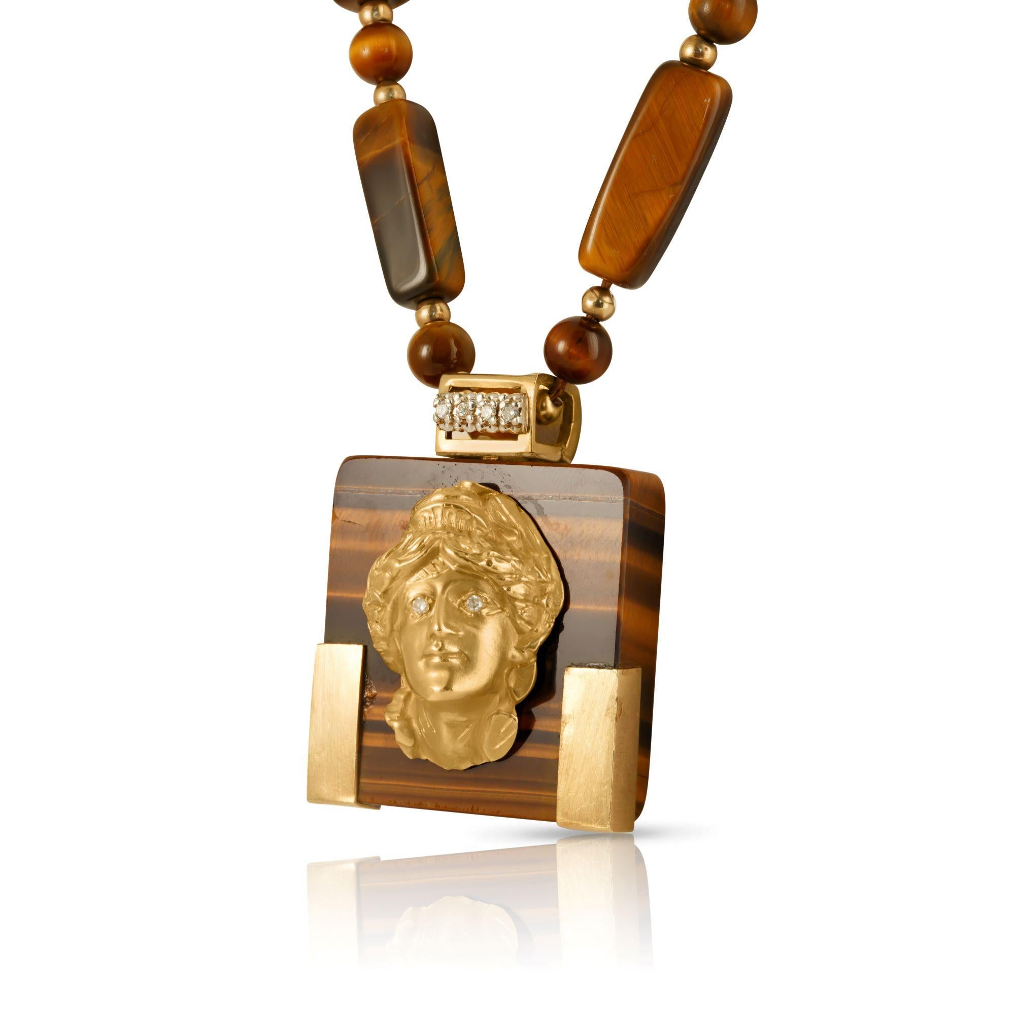 Mixed Cut Tiger Eye Necklace With Articulated 14ct Gold Portrait Pendant For Sale