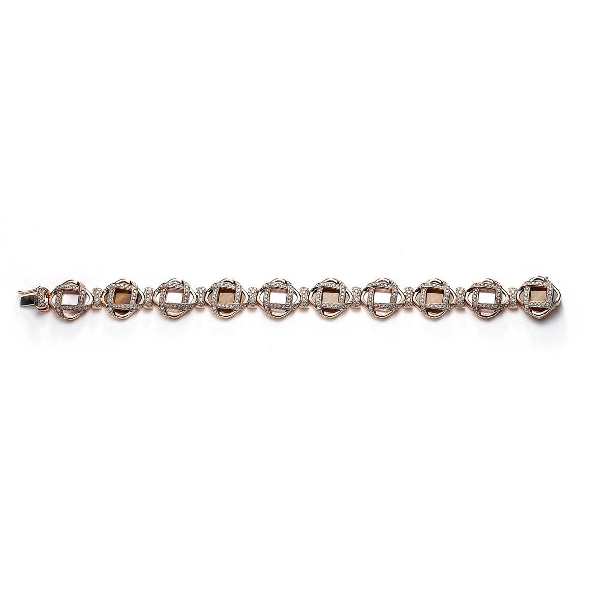 Bracelet in 18kt pink gold set with 350 diamonds 2.77 cts, 5 mother-of-pearl  11.39 cts and 5 tiger eye 9.74 cts       