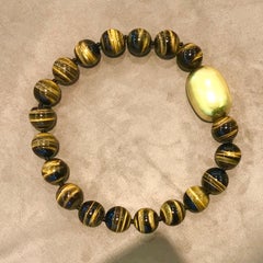 Tiger Eye bead necklace with domed rough polished clasp