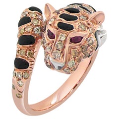Bague panthère en or rose 18 carats, diamant fantaisie, onyx et rubis