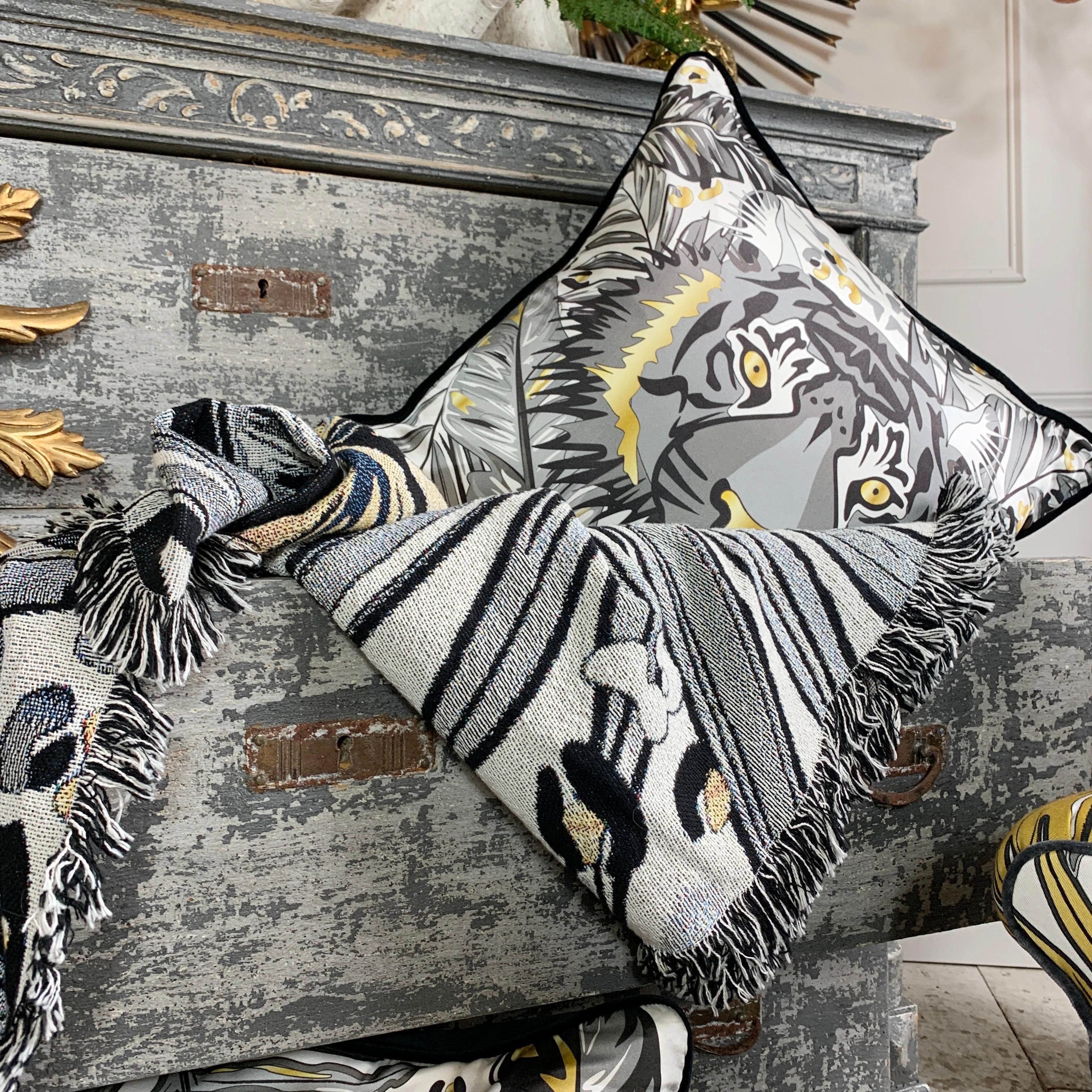 Be bold and fearless with our luxury silk 'Tiger' cushion from our Tropics range

This luxurious 100% silk cushion has a rich cotton velvet back and piped edge

Inspired by these iconic beautiful big cats and the lush tropical jungle leaves from the
