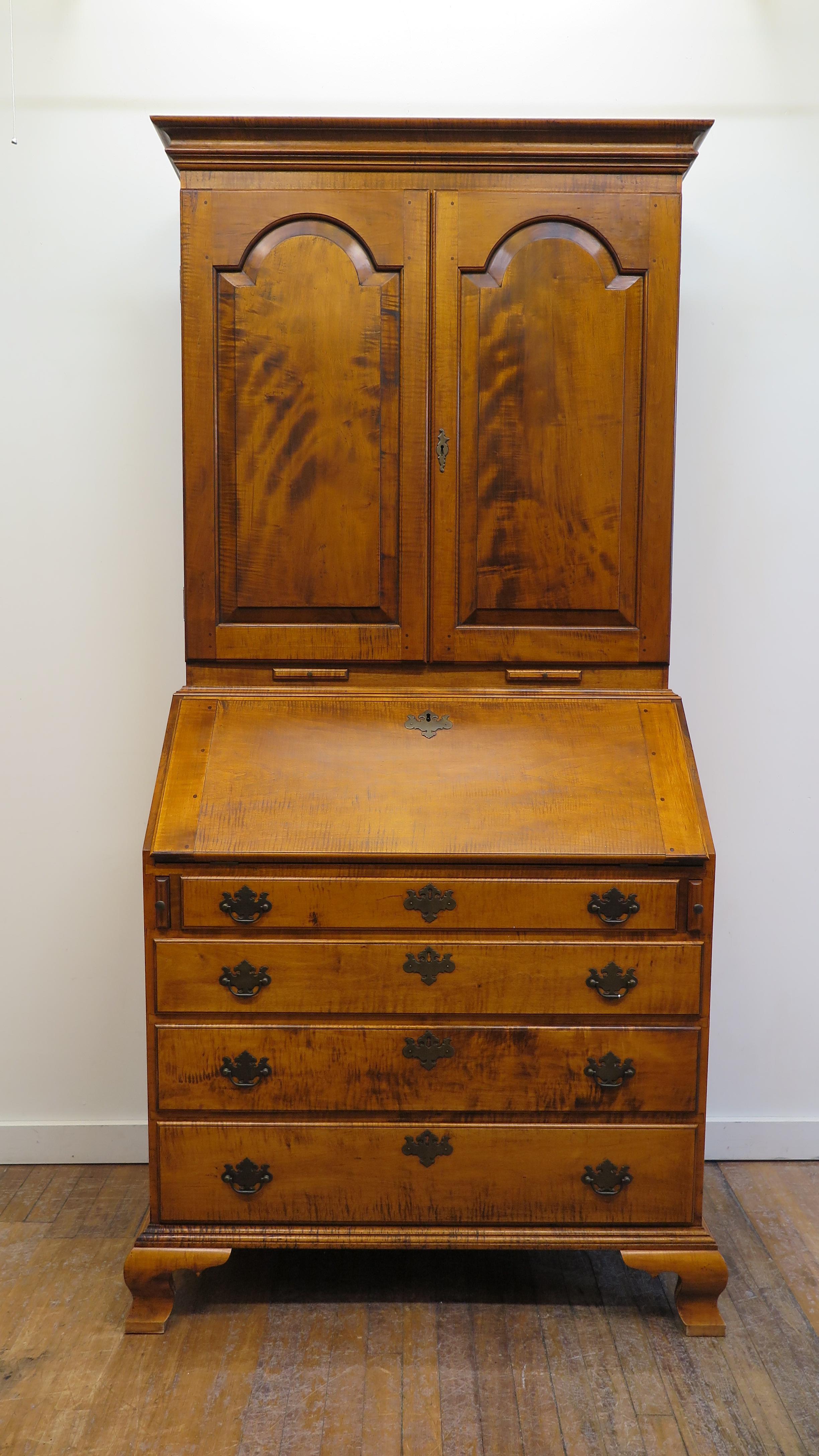 Mid century tiger maple secretary hand made by renowned cabinet maker Kurt Richeburg Hanover MA. Signed on back LeFort - Kurt Richenburg Hanover MA. A Chippendale Style Tiger Maple Secretary of the high quality finely crafted by master cabinetmaker.