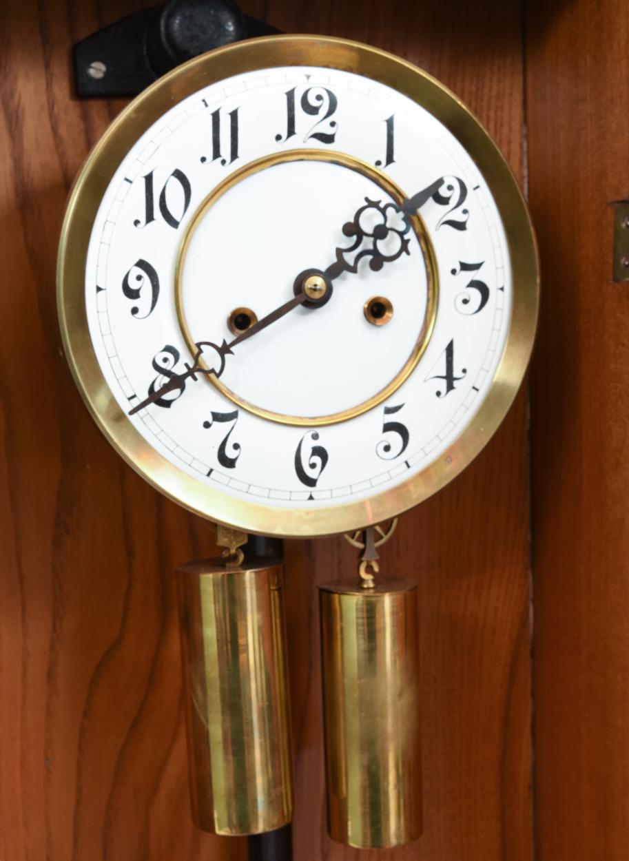 Late 19th Century Tiger Oak Case Beveled Glass Trimmed Brass Wall Clock