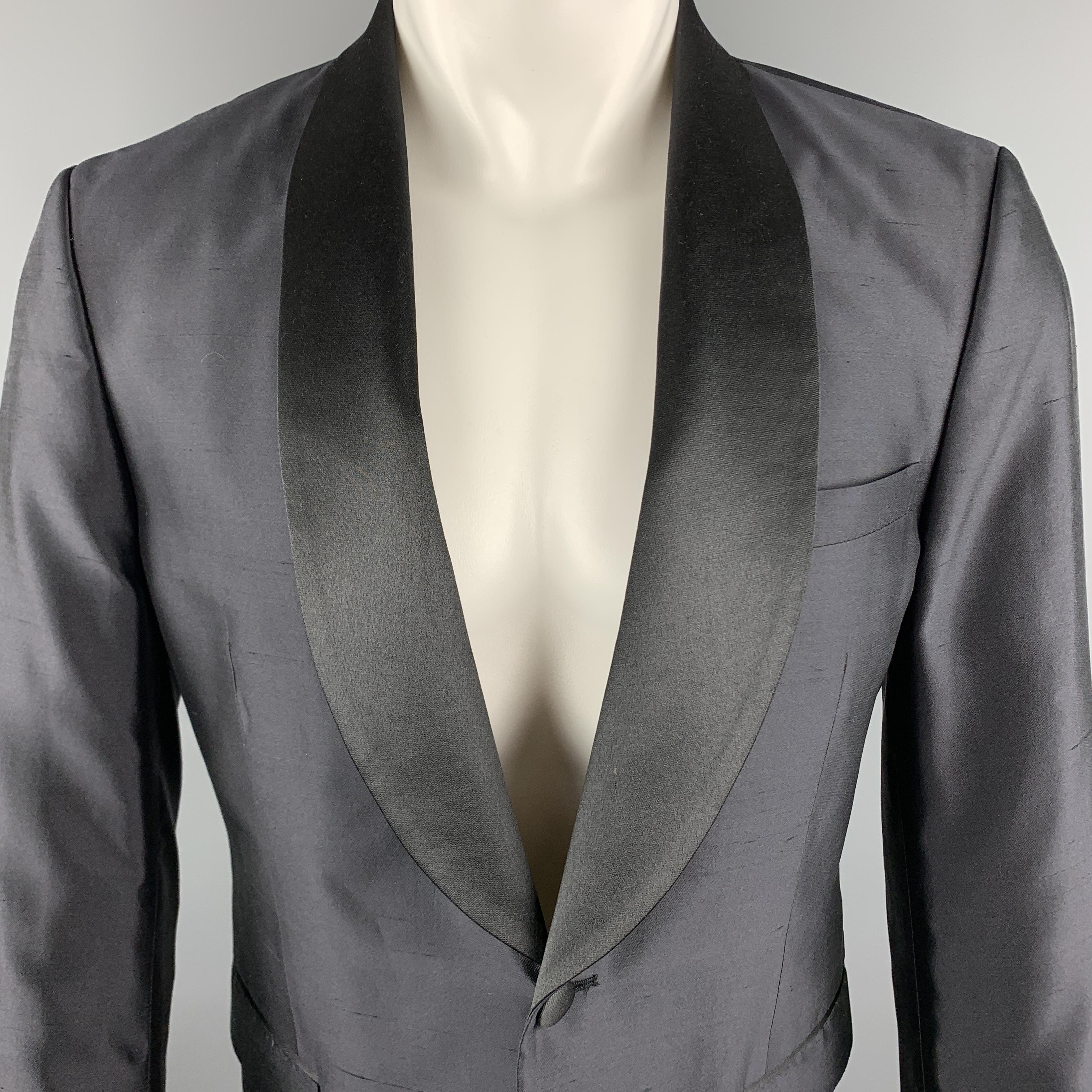 TIGER OF SWEDEN Tuxedo Sport Coat comes in a black silk material, with a satin shawl collar, slit pockets, a single button at closure, single breasted, with a single button at cuffs and a single vent at back. Made in Romania. 

Excellent Pre-Owned
