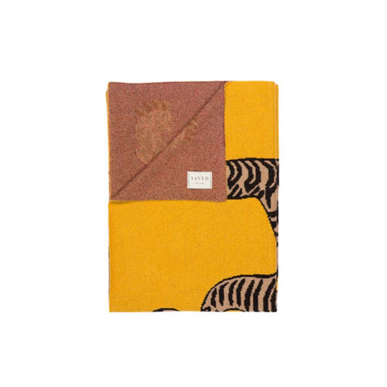 The auspicious Caspian tiger celebrated in Mongolian and Tibetan traditions adorns the Tiger Rug throw. Vibrant in colour and fierce in design, the weave is a luxurious pairing of Mongolian Cashmere and Fine baby camel hair. 

Additional